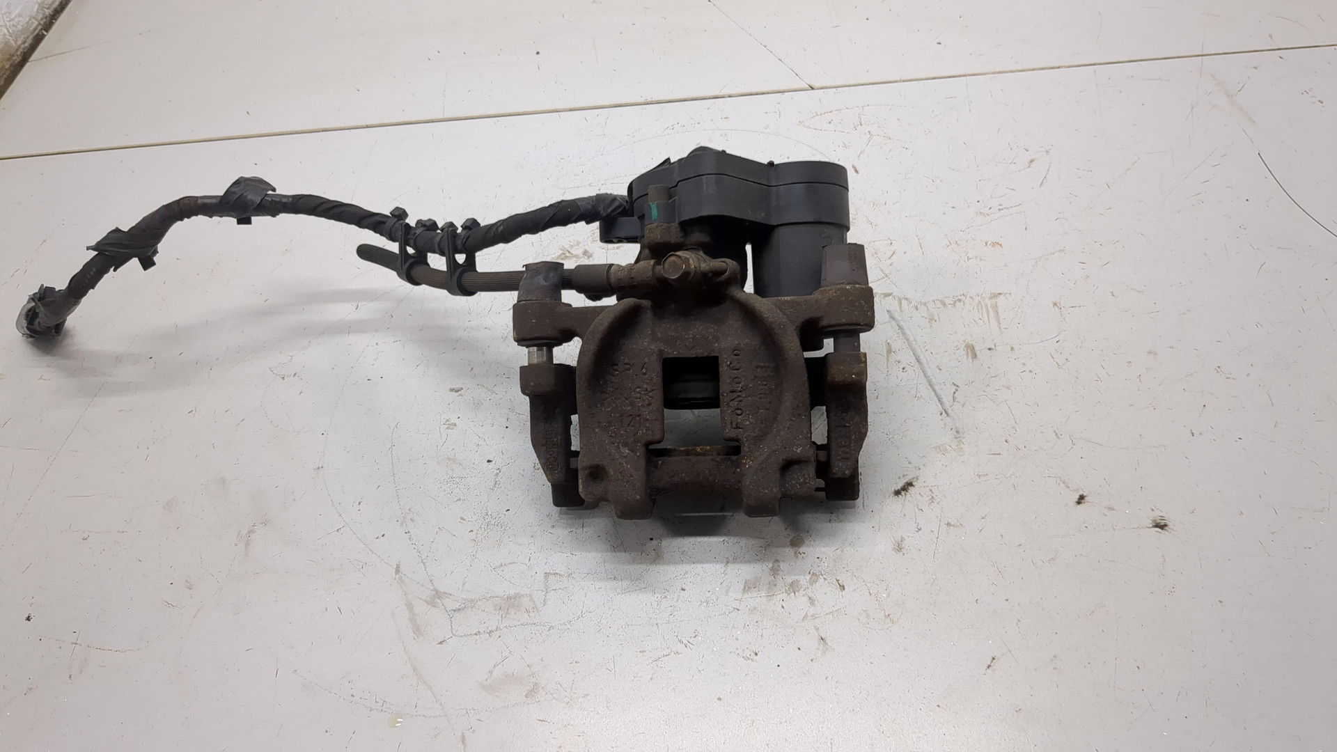 Суппорт задний левый