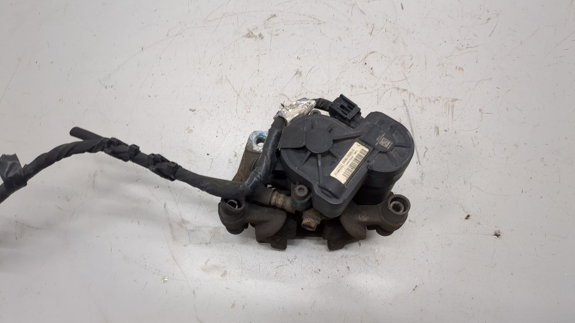 Суппорт задний левый