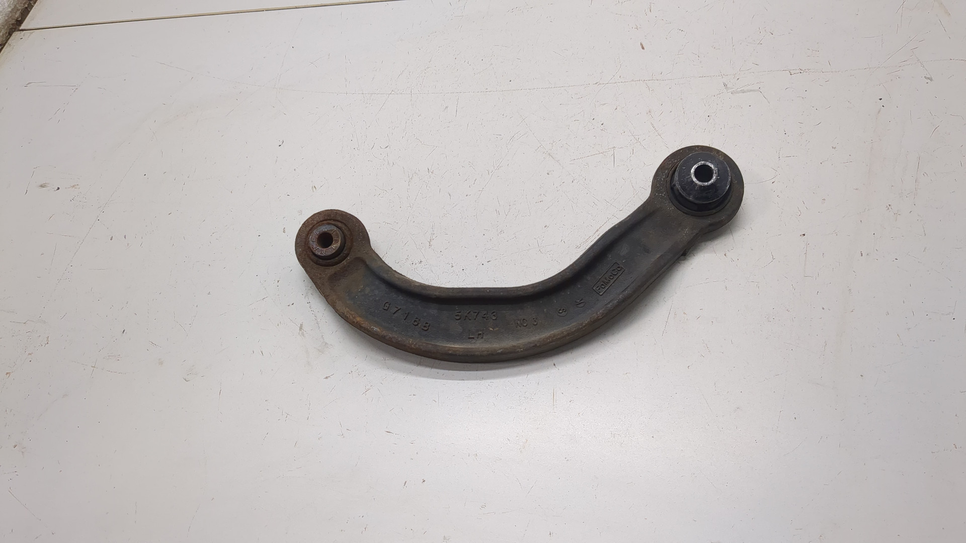 Рычаг задний левый