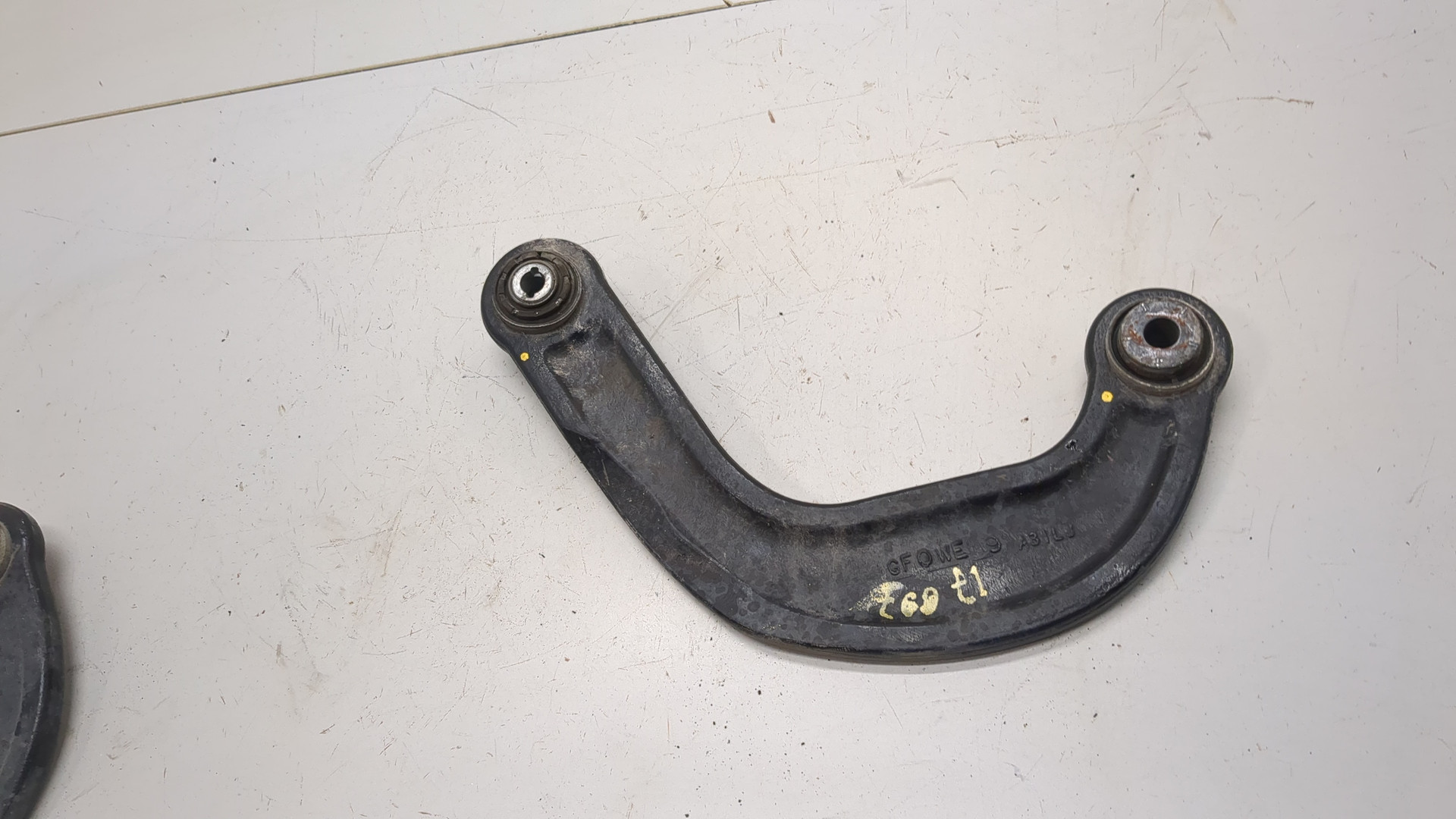 Рычаг задний левый