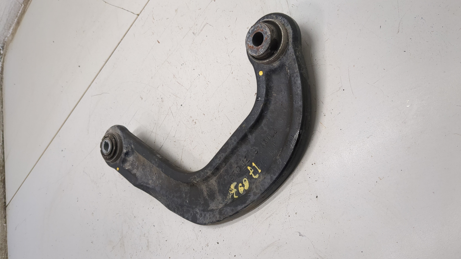 Рычаг задний левый