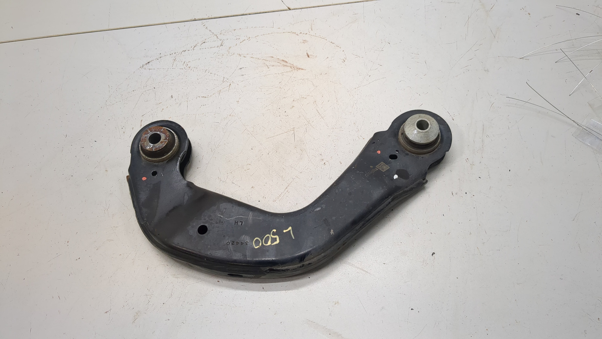 Рычаг задний левый