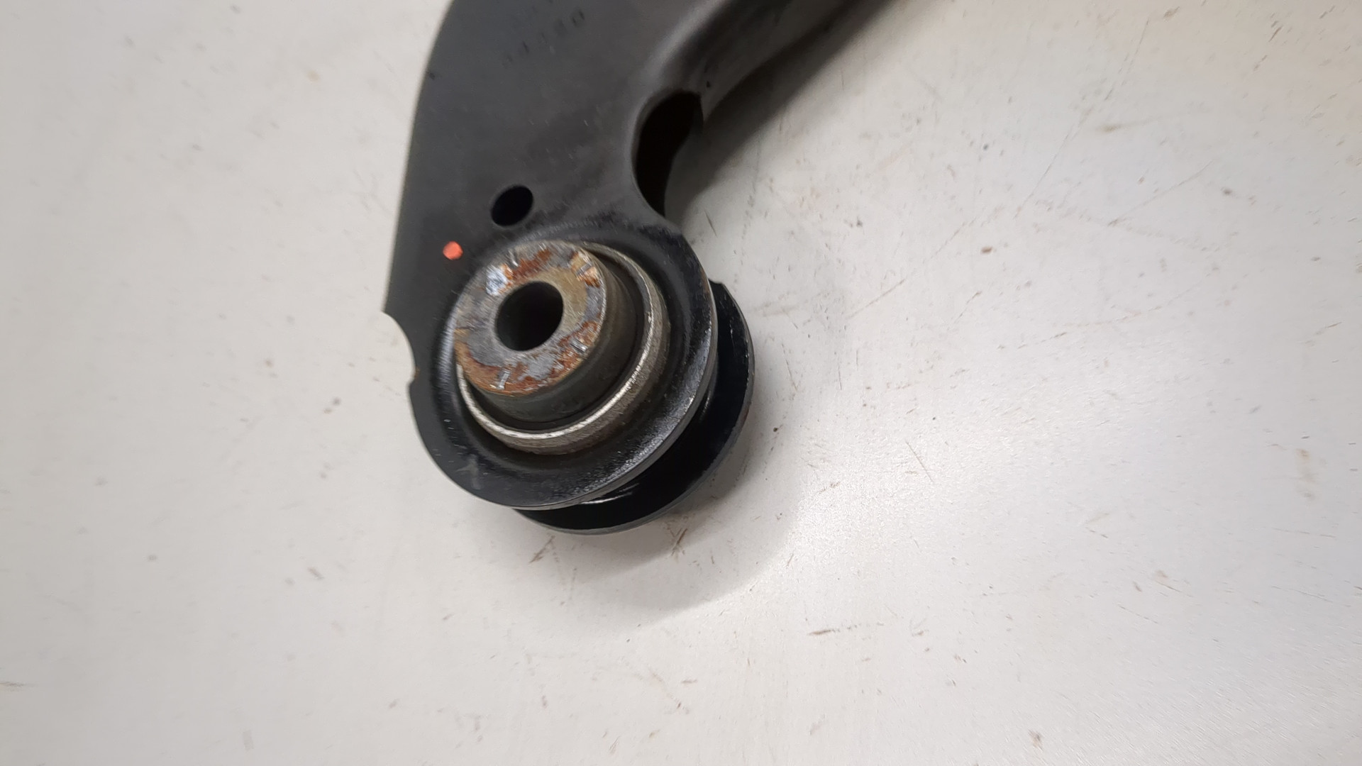 Рычаг задний левый