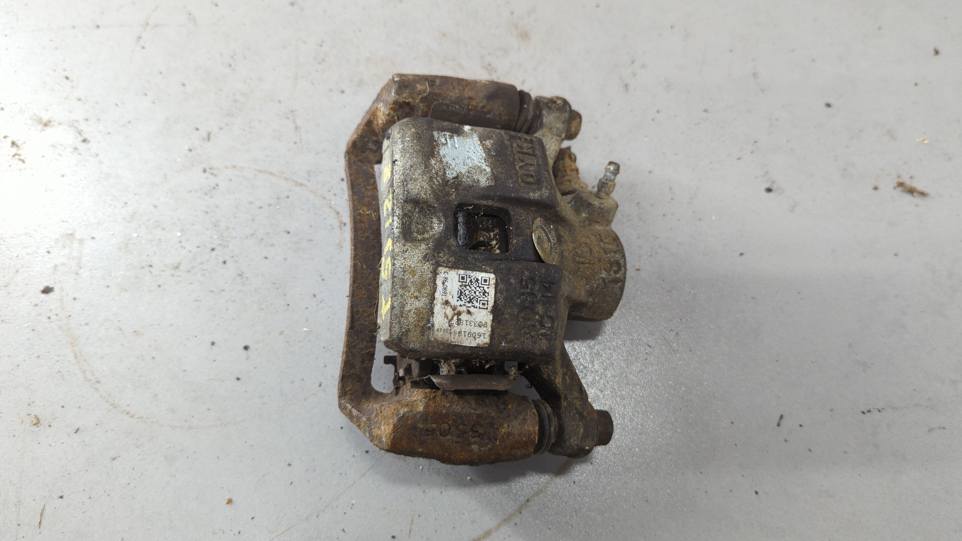 Суппорт задний левый