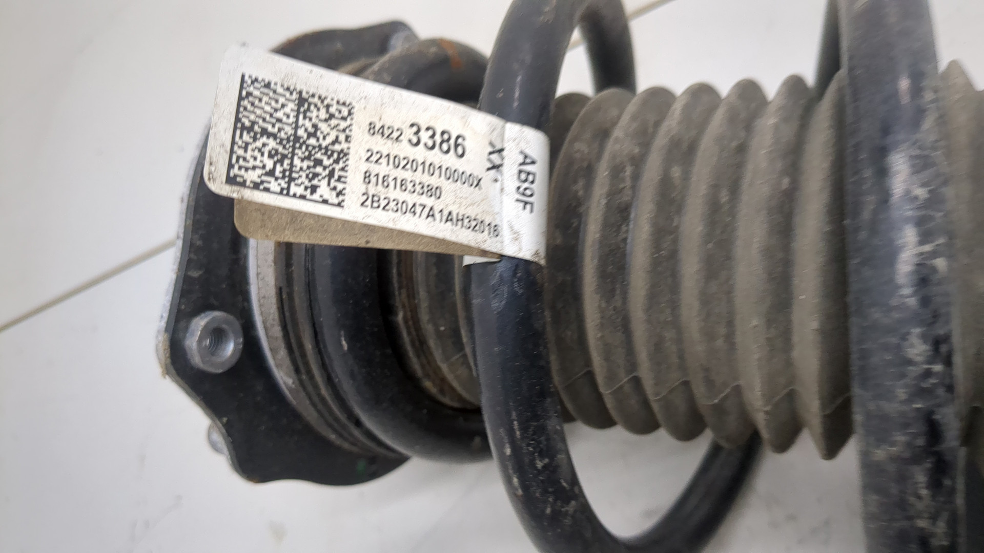 Амортизатор передний левый