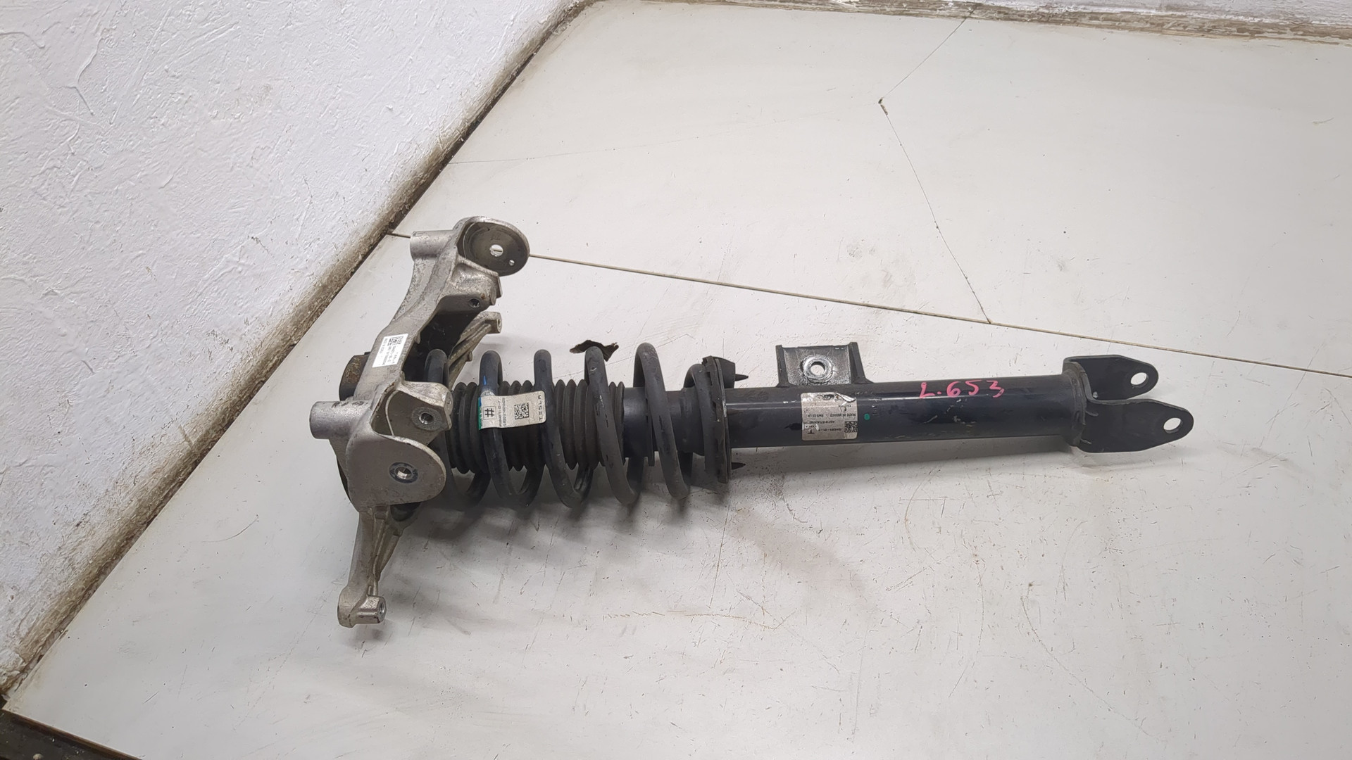 Амортизатор передний левый