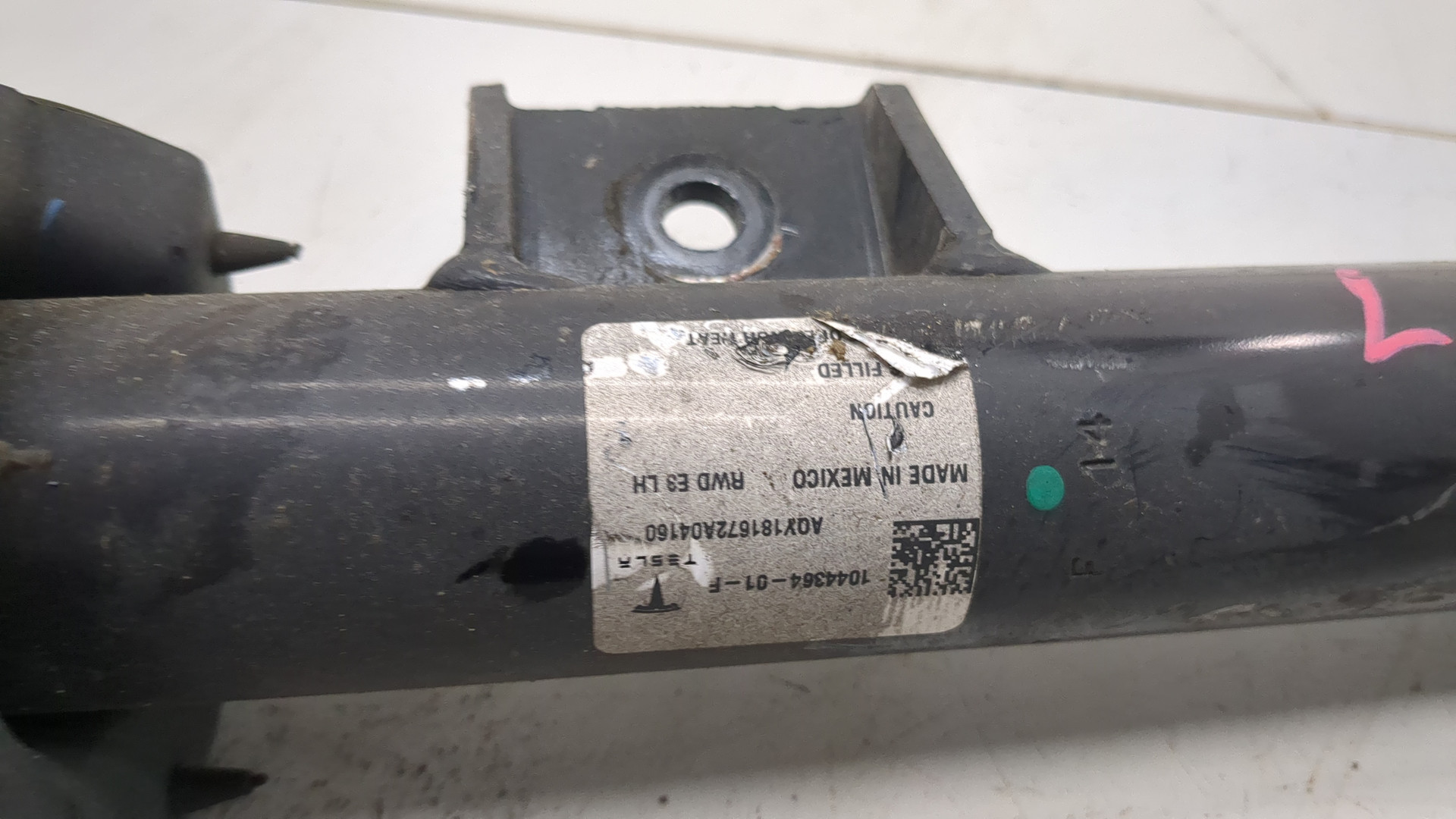 Амортизатор передний левый