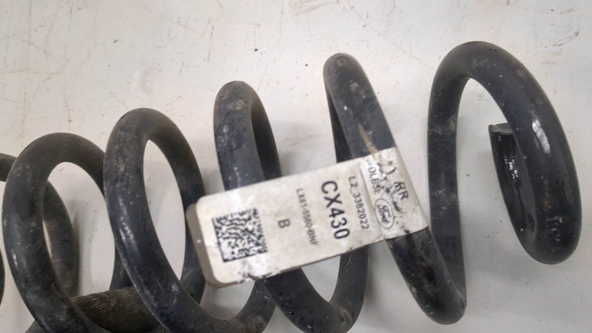 Пружина задняя