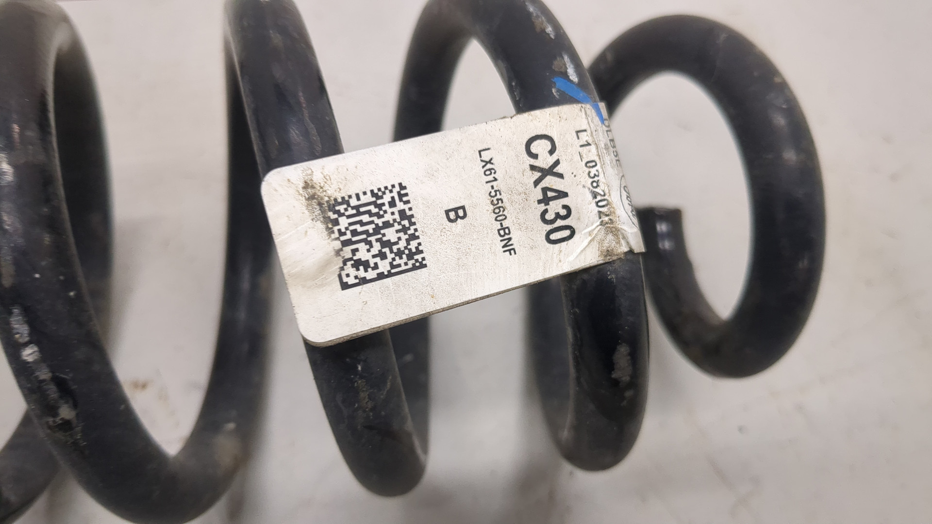 Пружина задняя