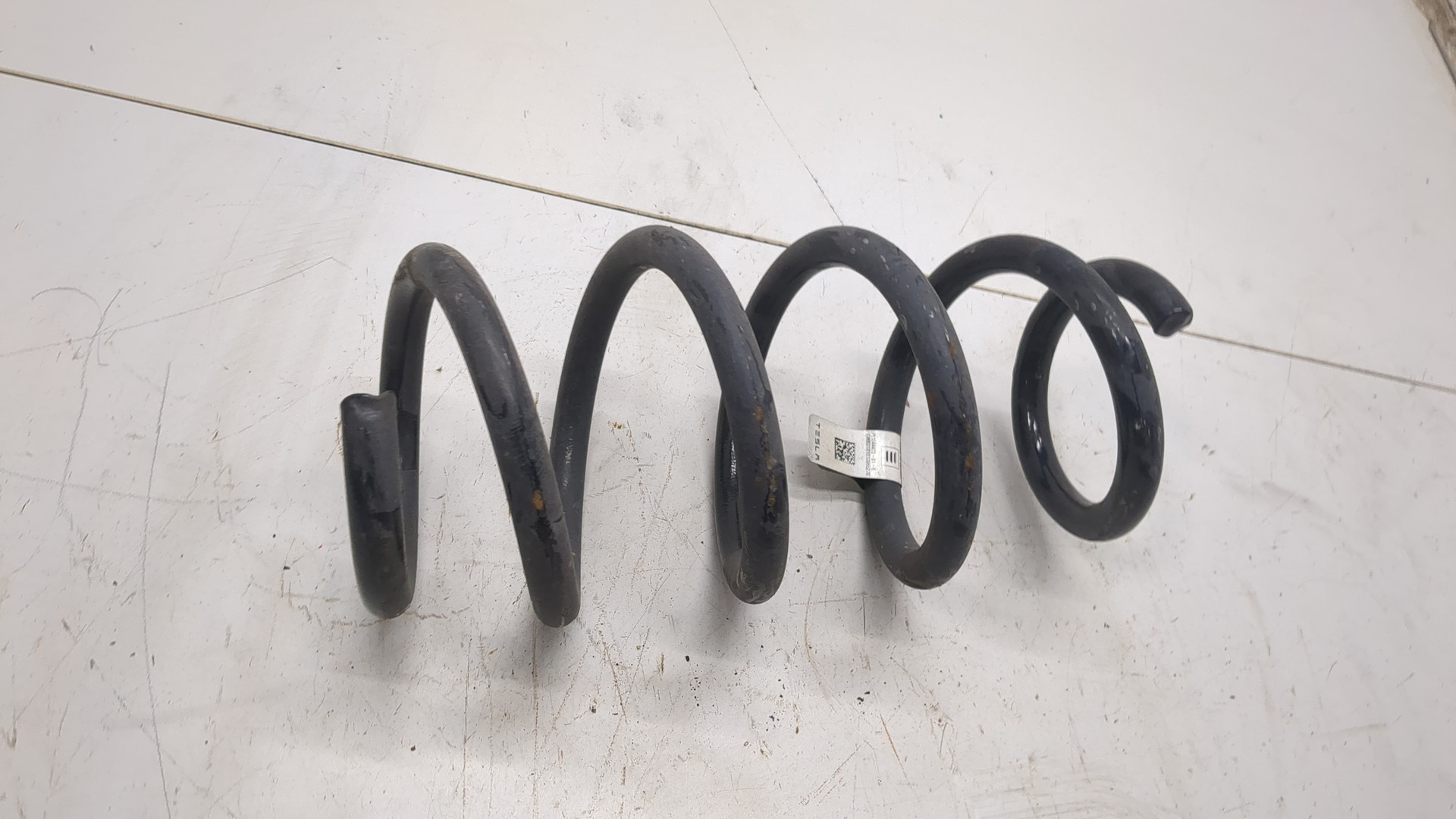 Пружина задняя