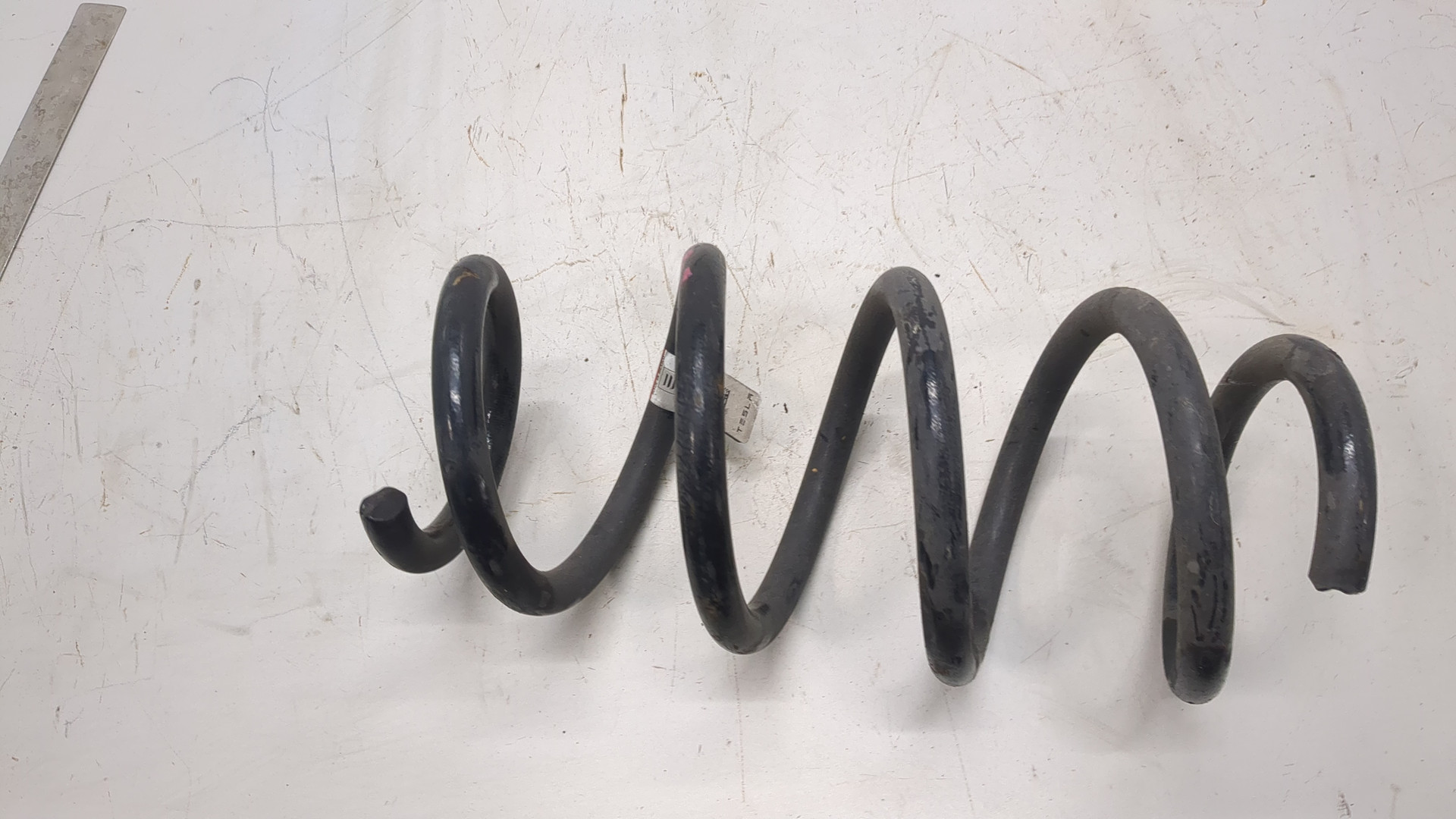 Пружина задняя