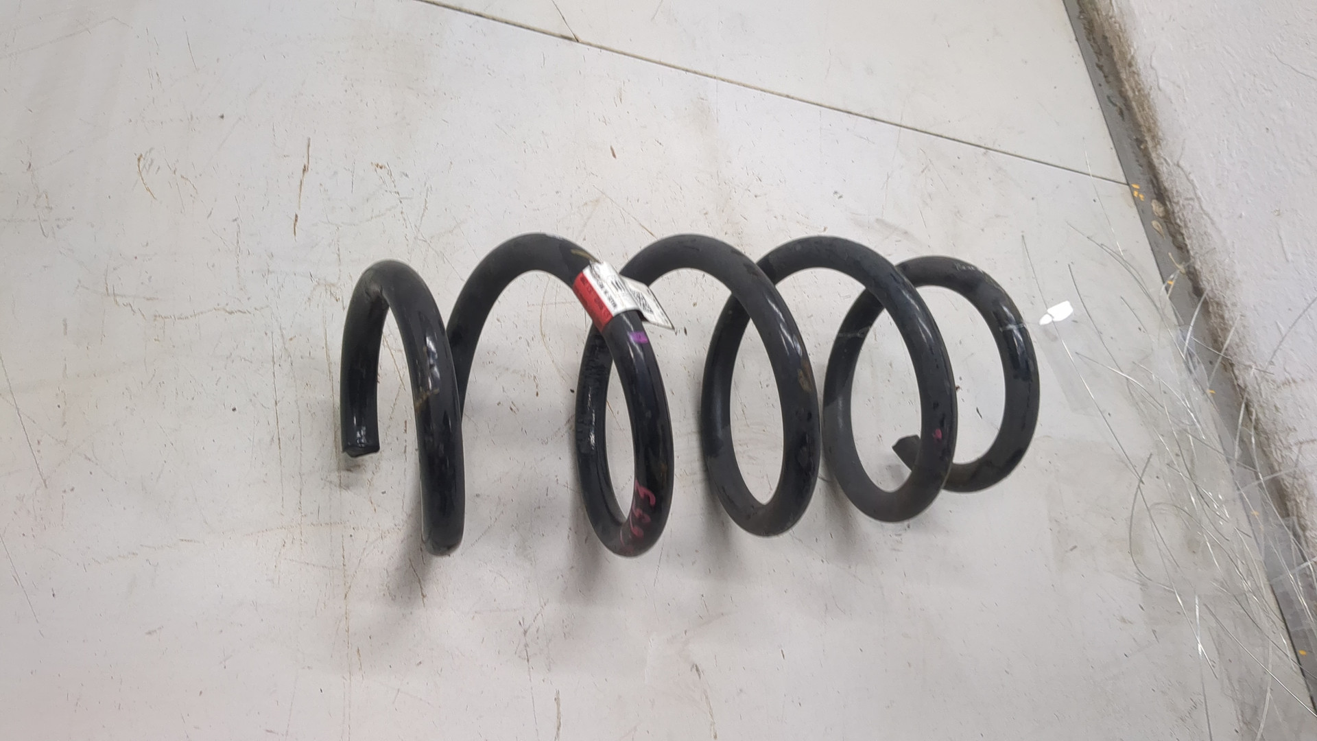 Пружина задняя