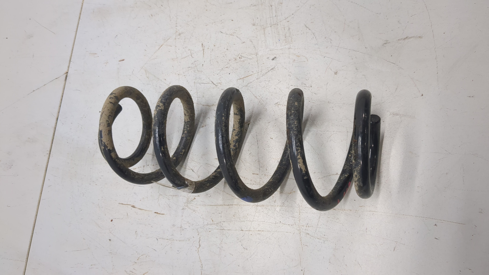 Пружина задняя