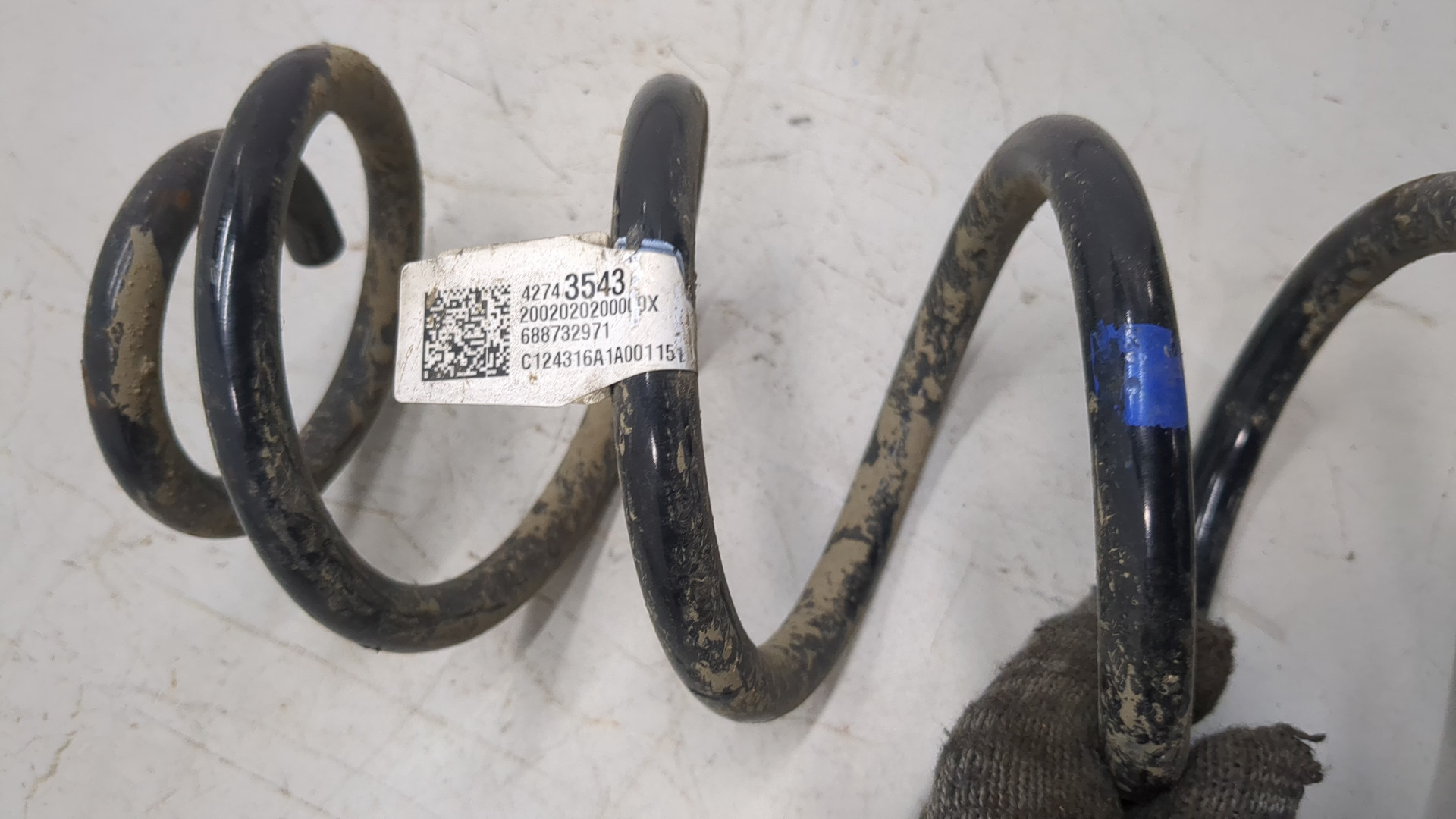 Пружина задняя