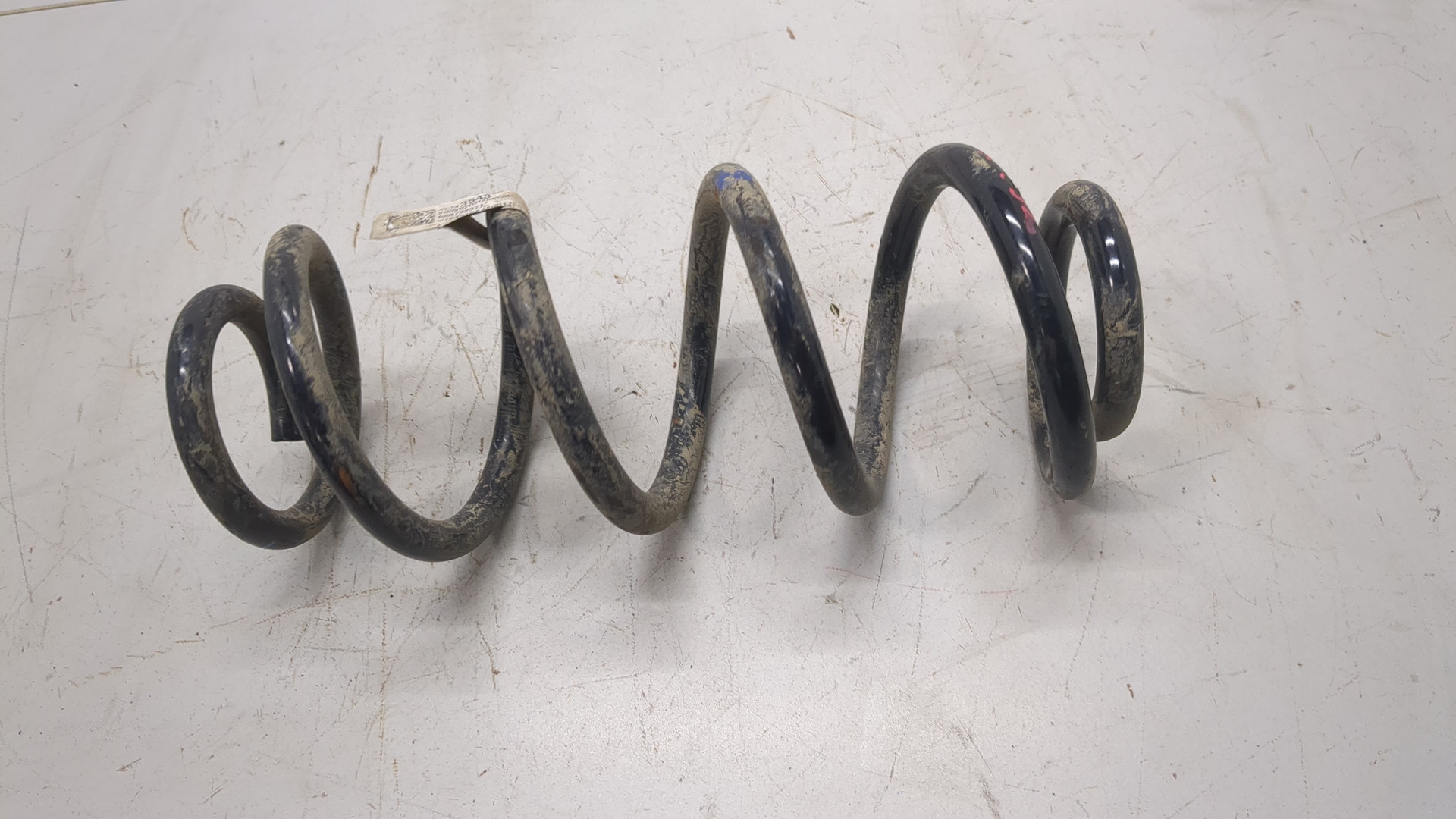 Пружина задняя