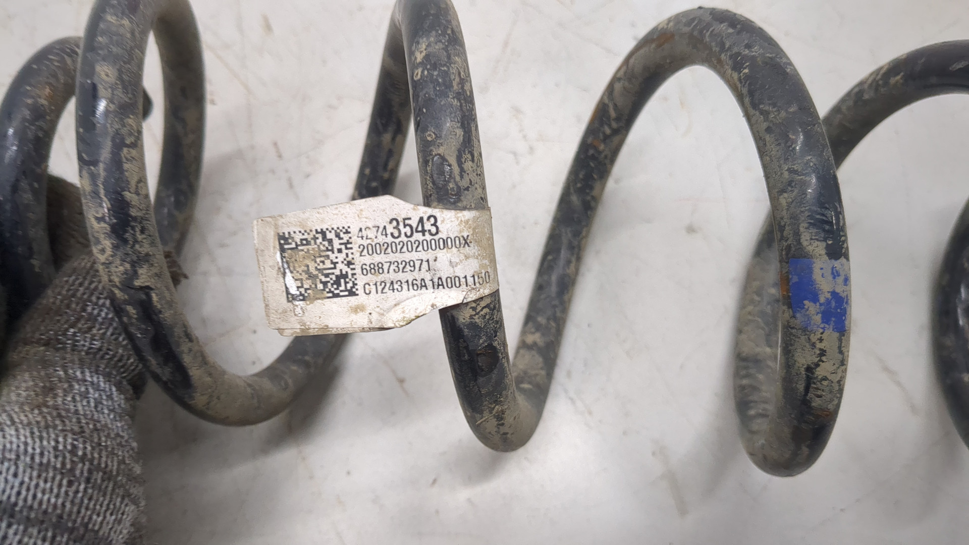 Пружина задняя