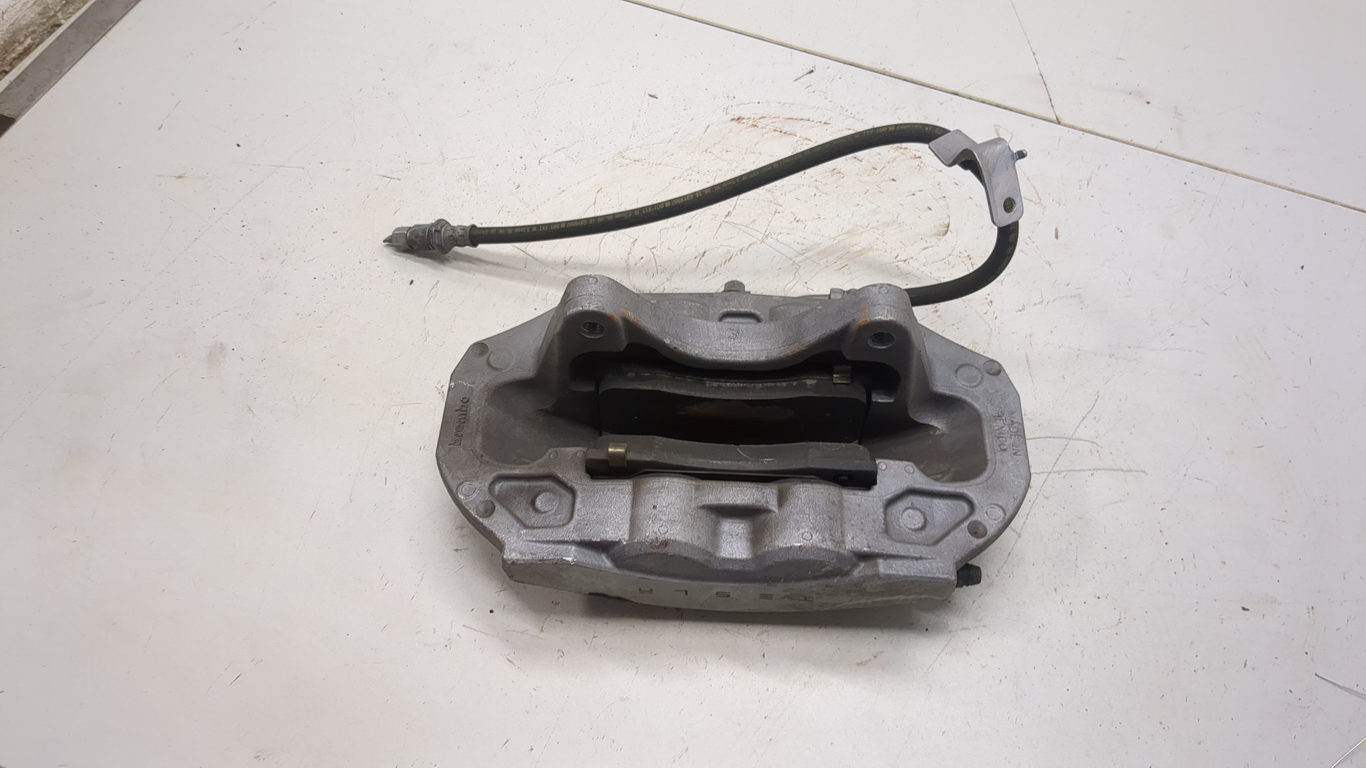 Суппорт передний левый