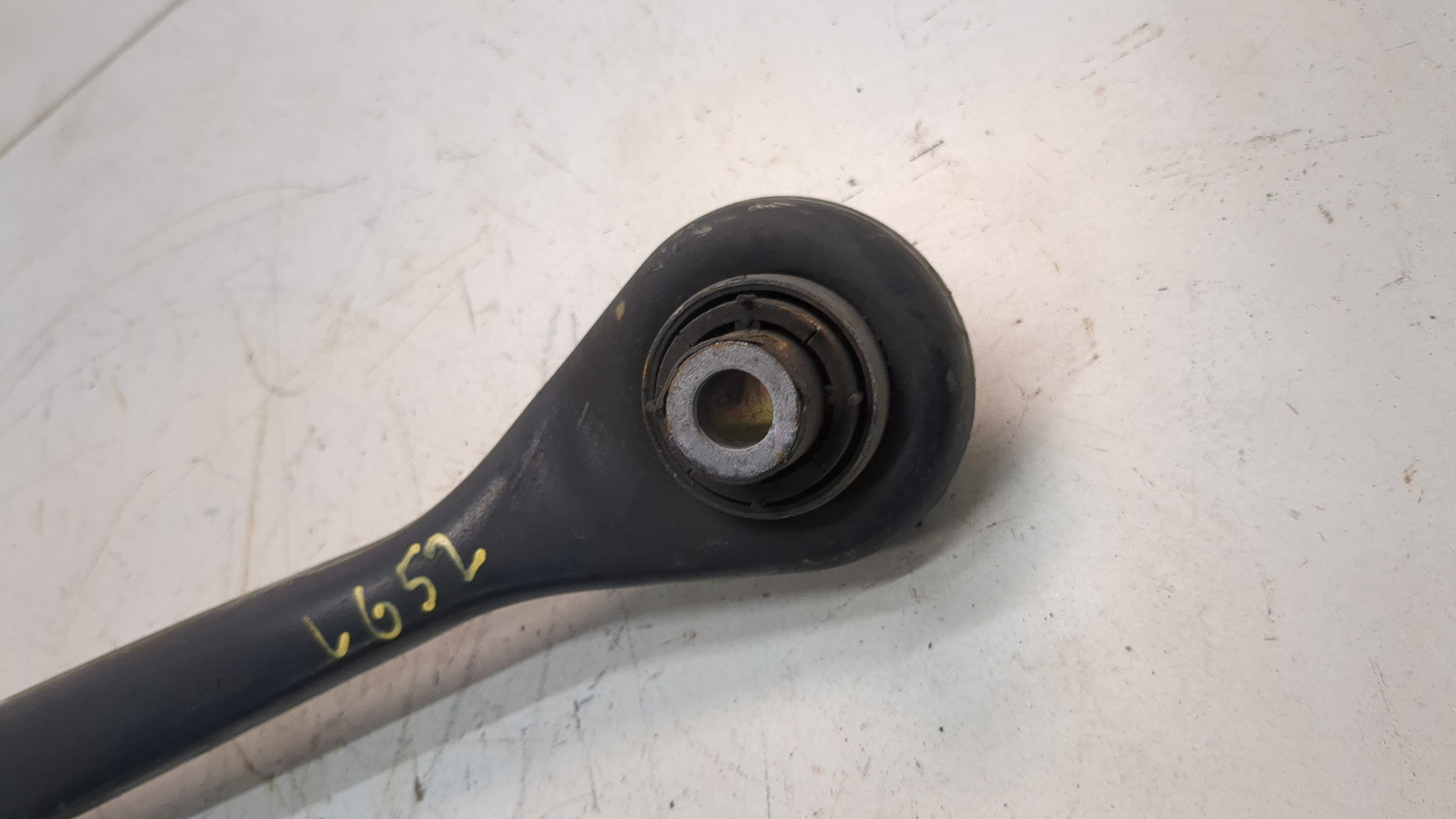 Рычаг задний левый