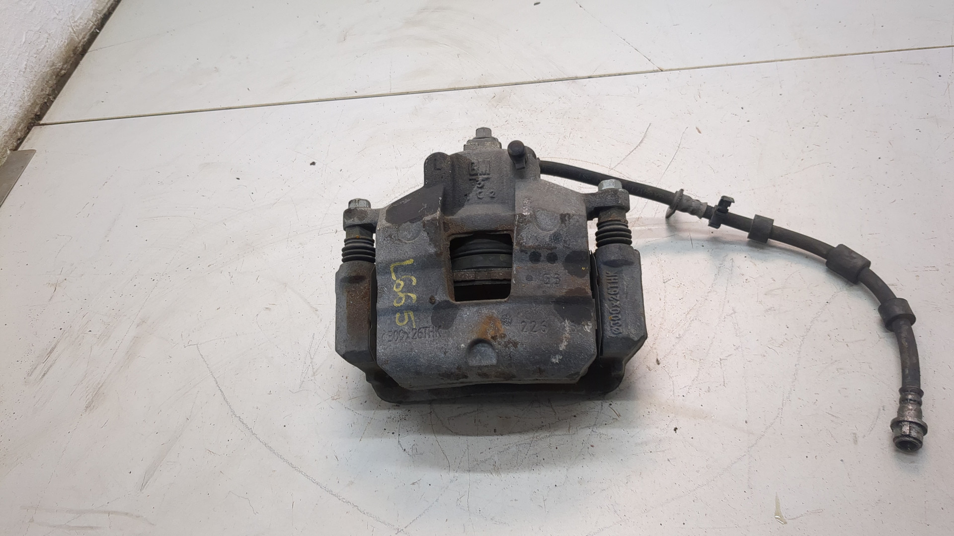 Суппорт передний левый