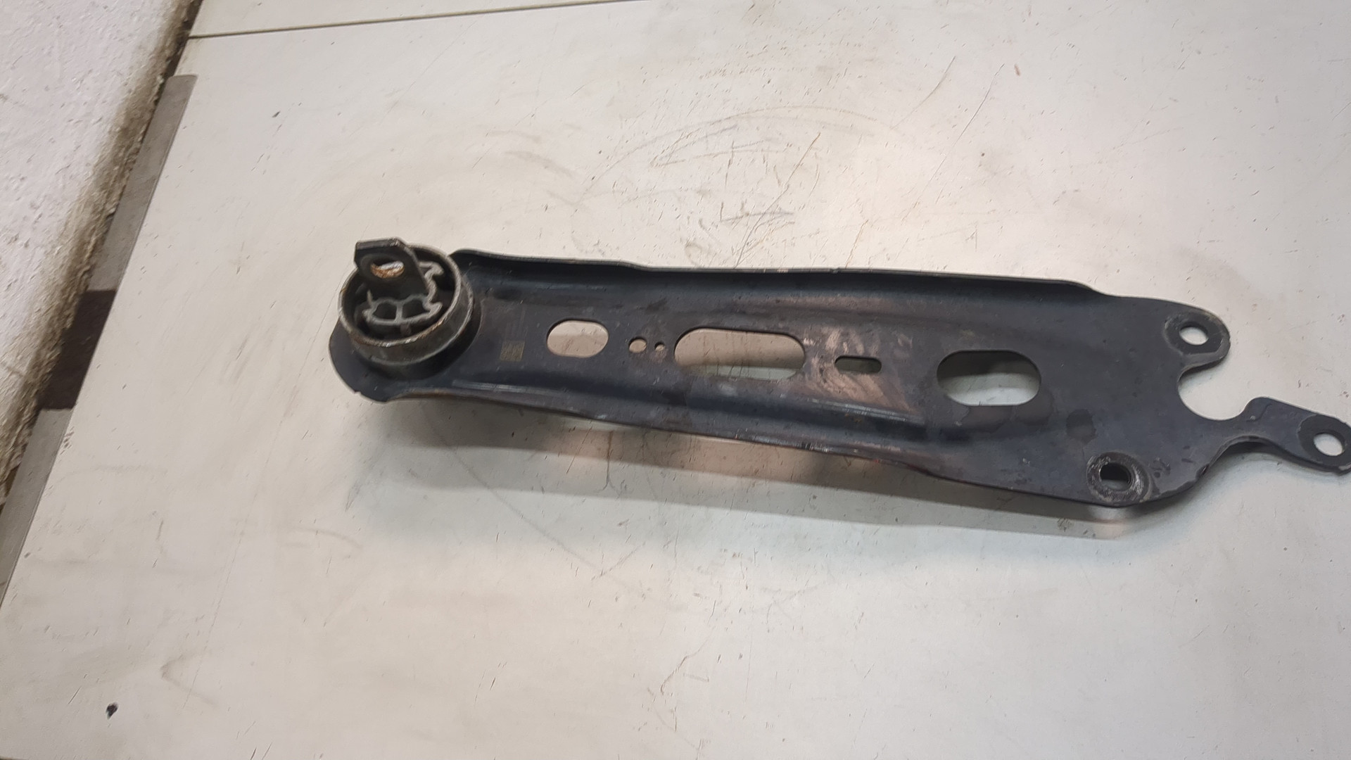 Рычаг задний левый