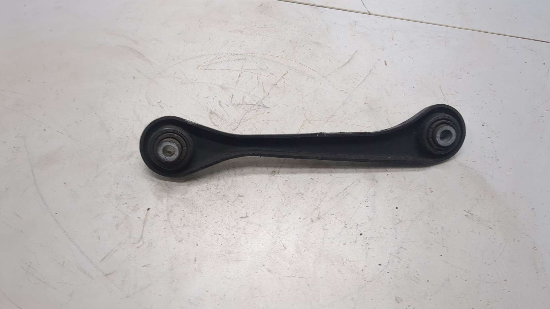 Рычаг задний правый