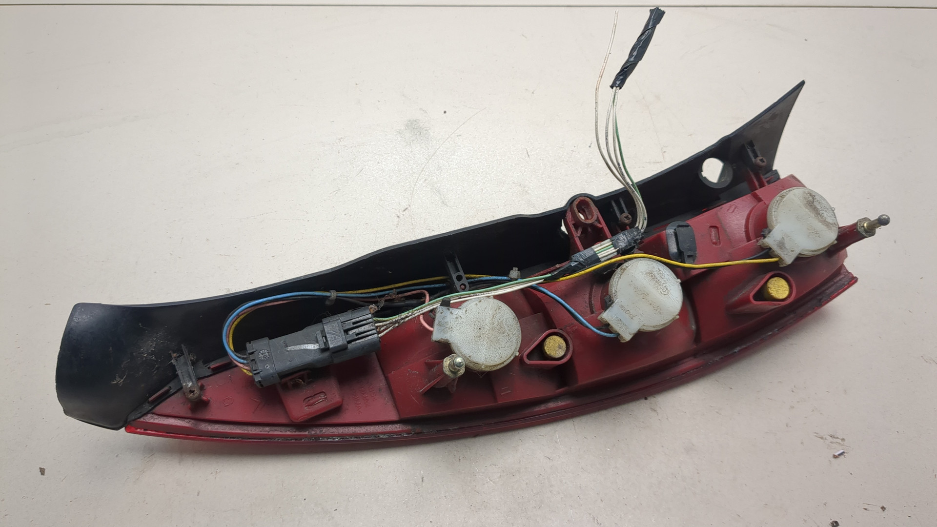 Фонарь задний левый