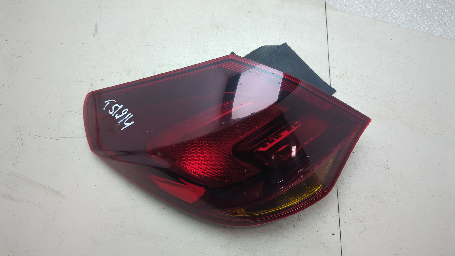 Фонарь задний левый