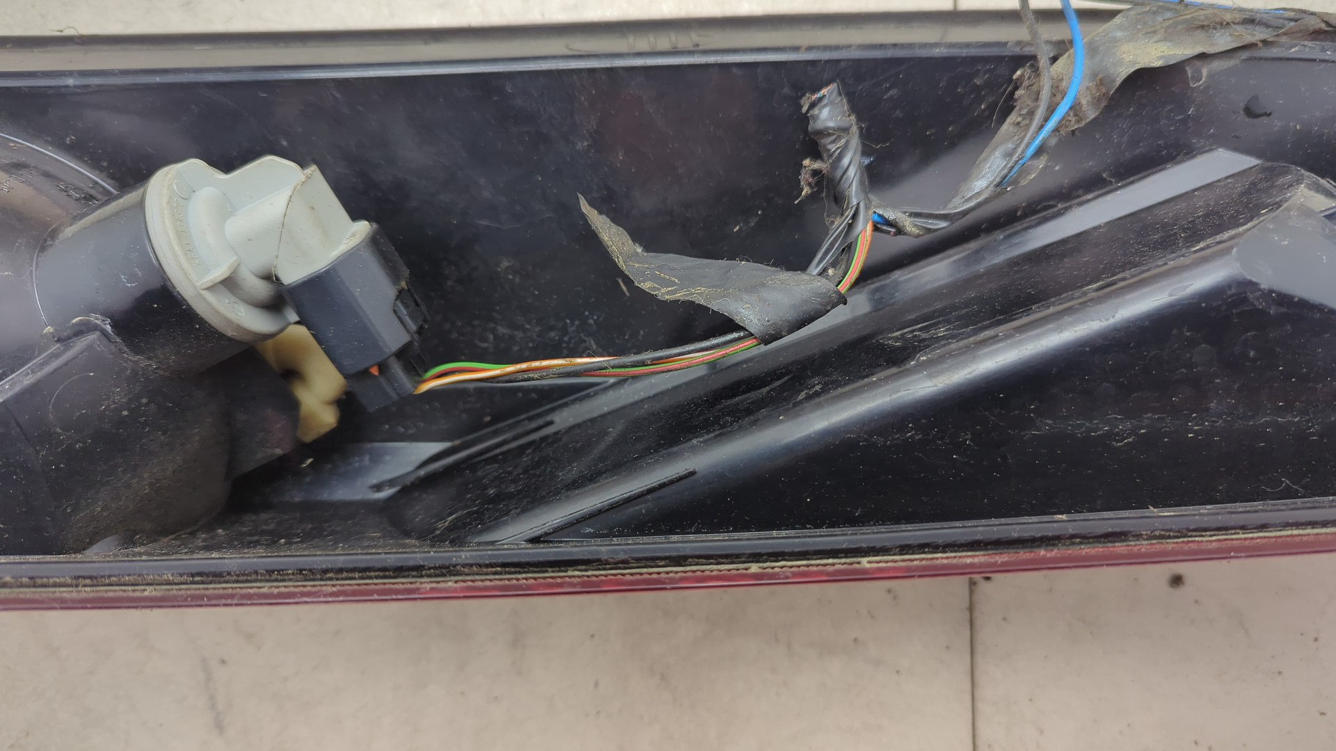 Фонарь задний левый