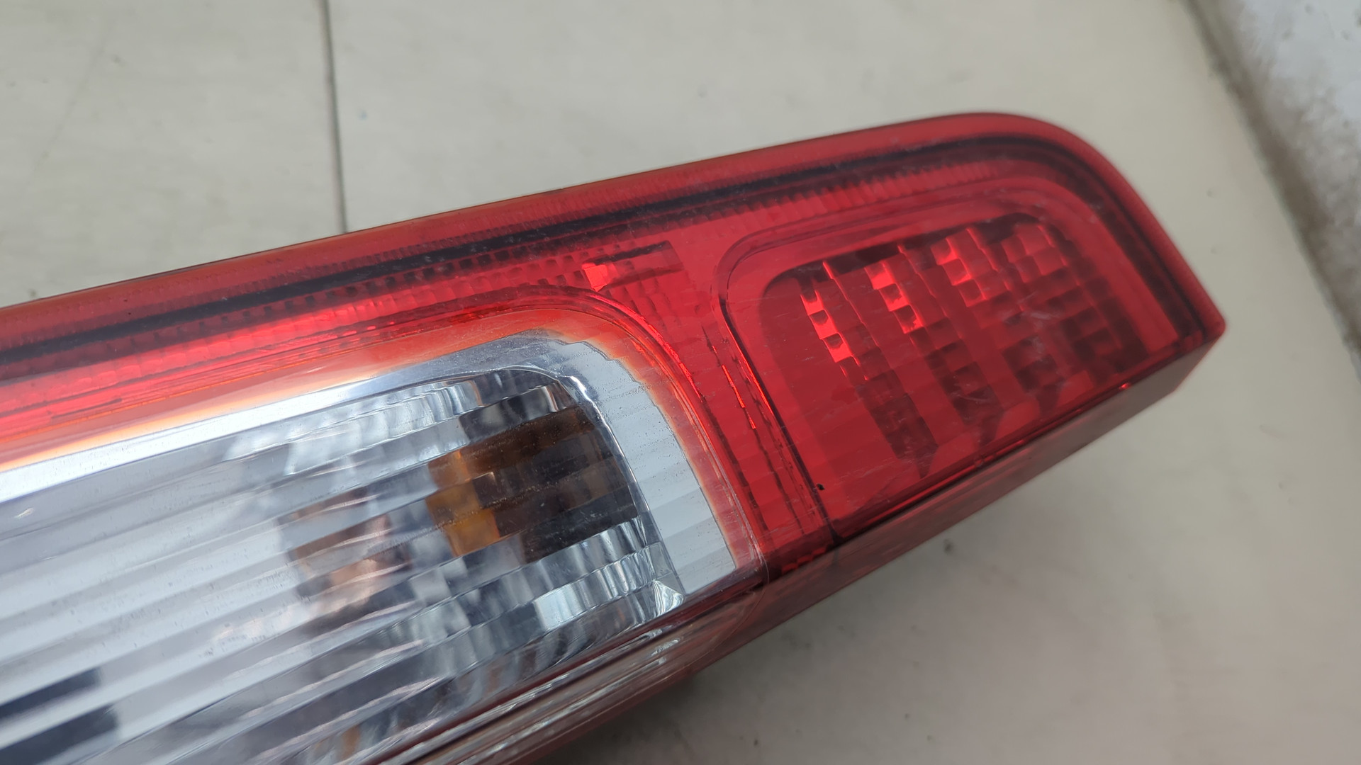 Фонарь задний левый