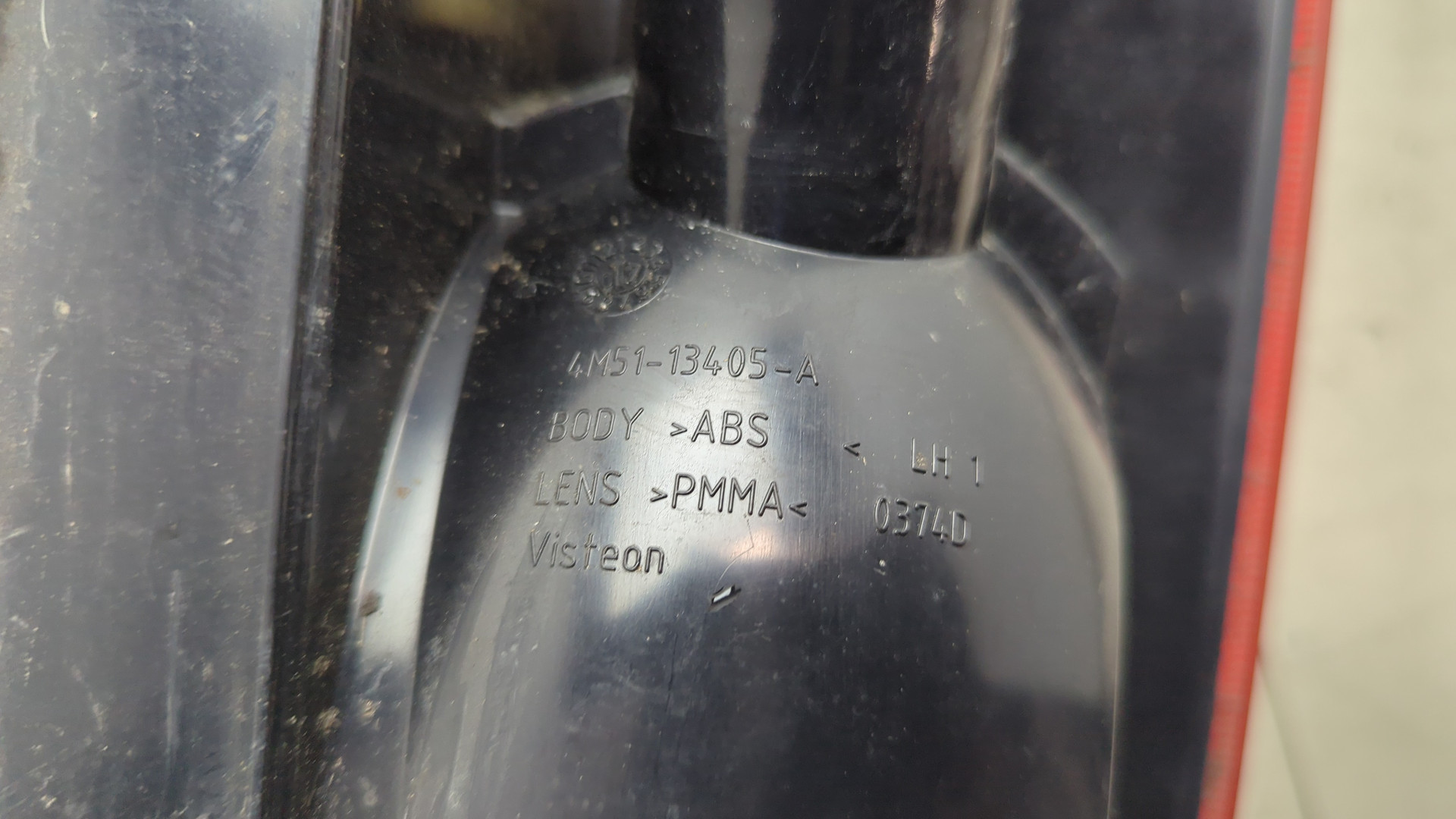 Фонарь задний левый