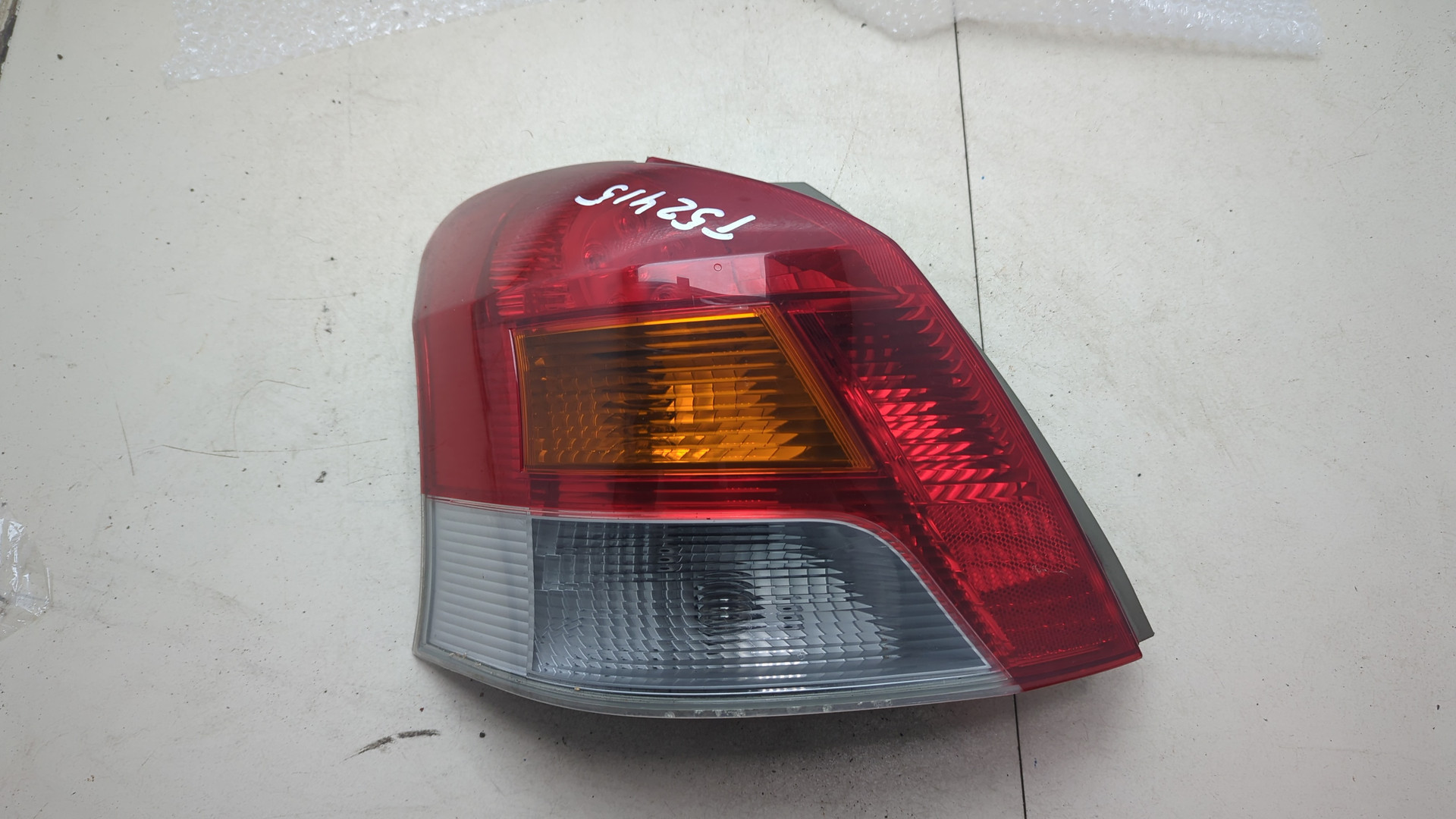 Фонарь задний левый