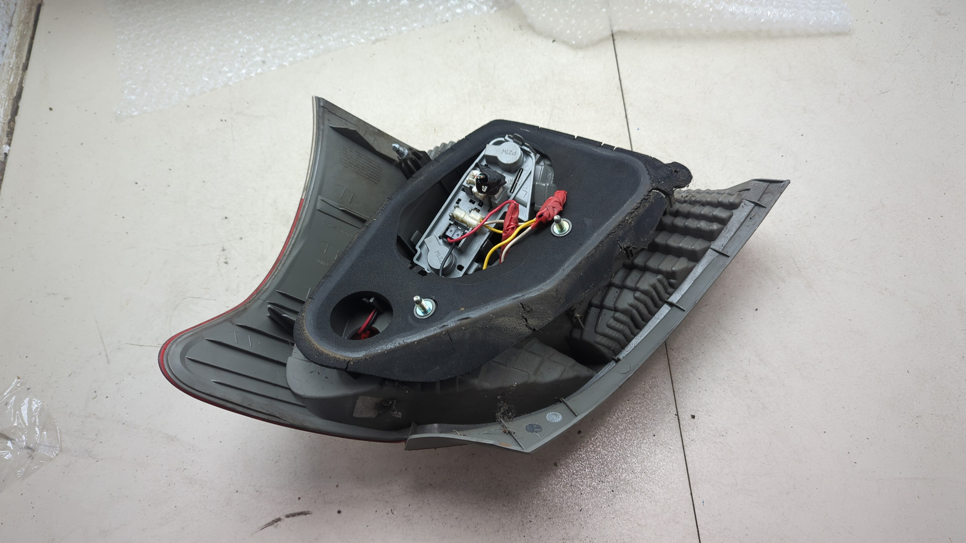 Фонарь задний левый