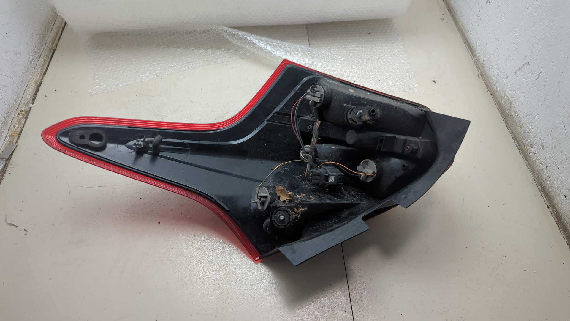 Фонарь задний левый