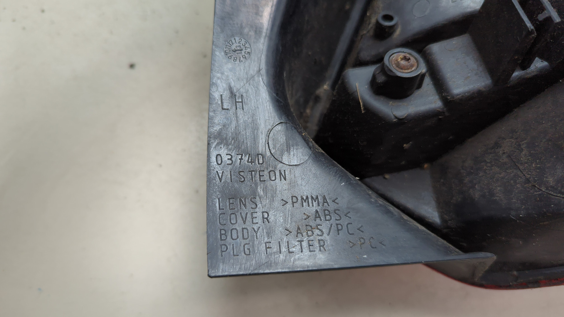 Фонарь задний левый