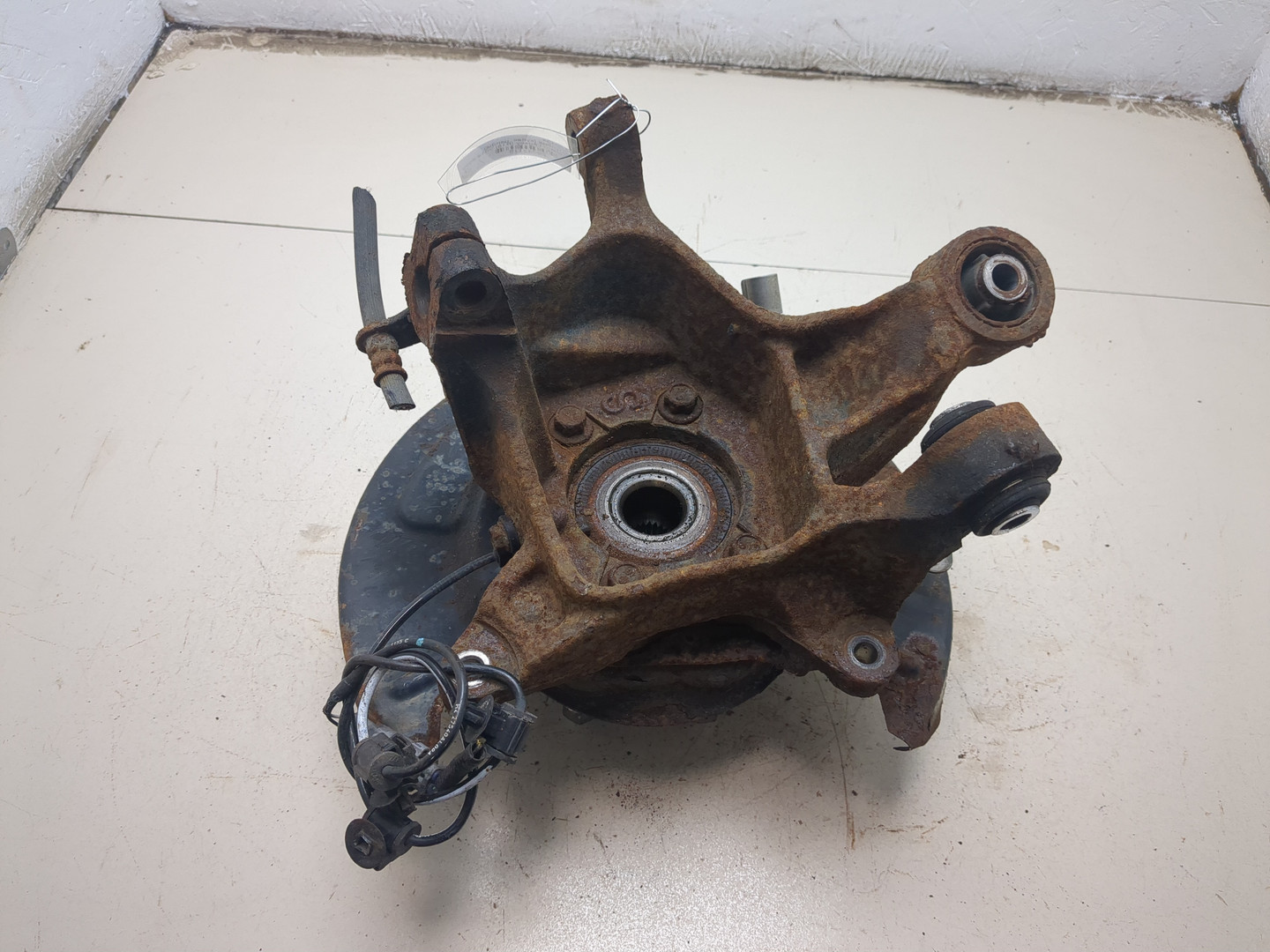 Кулак поворотный задний левый