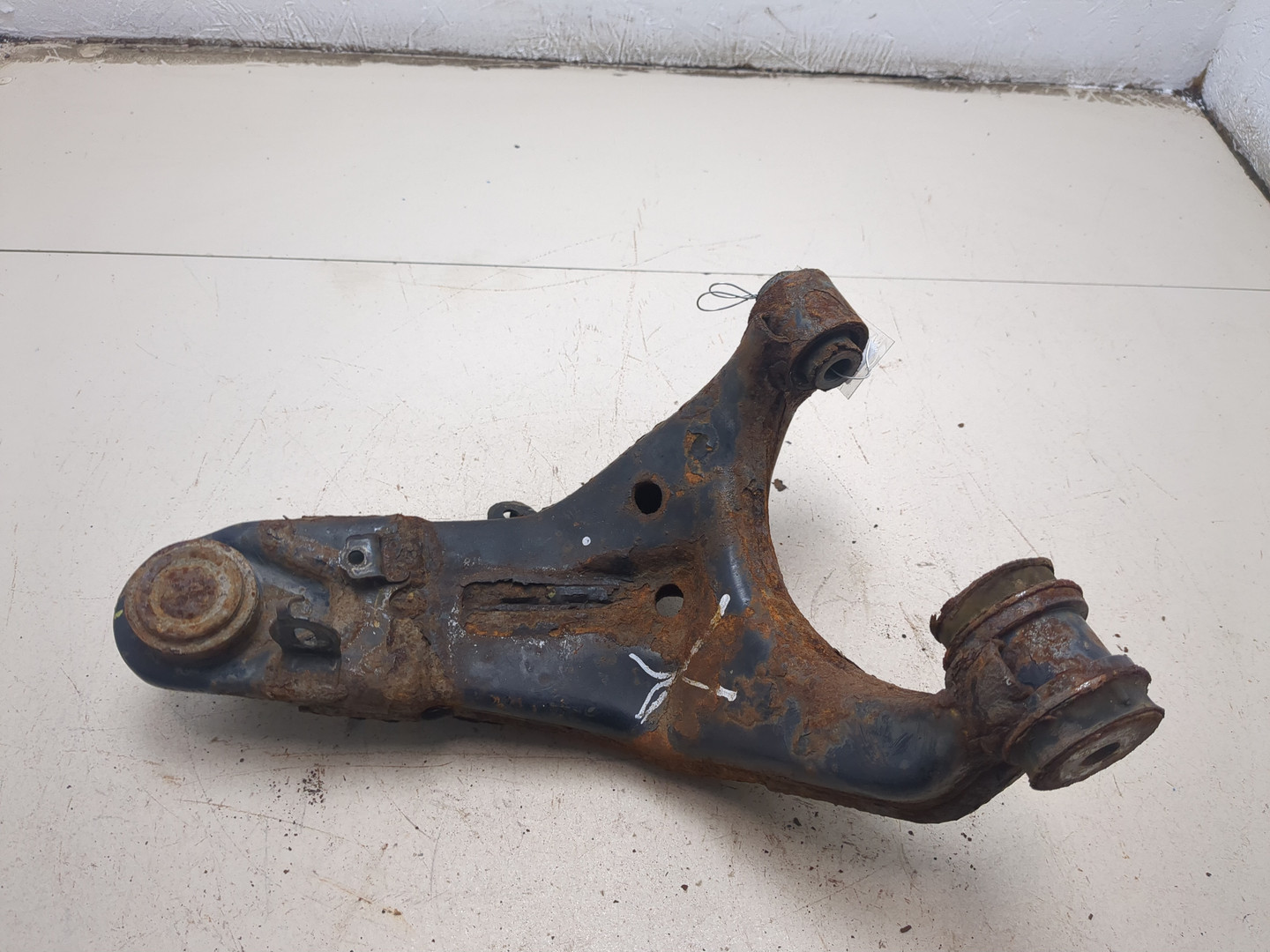 Рычаг задний левый