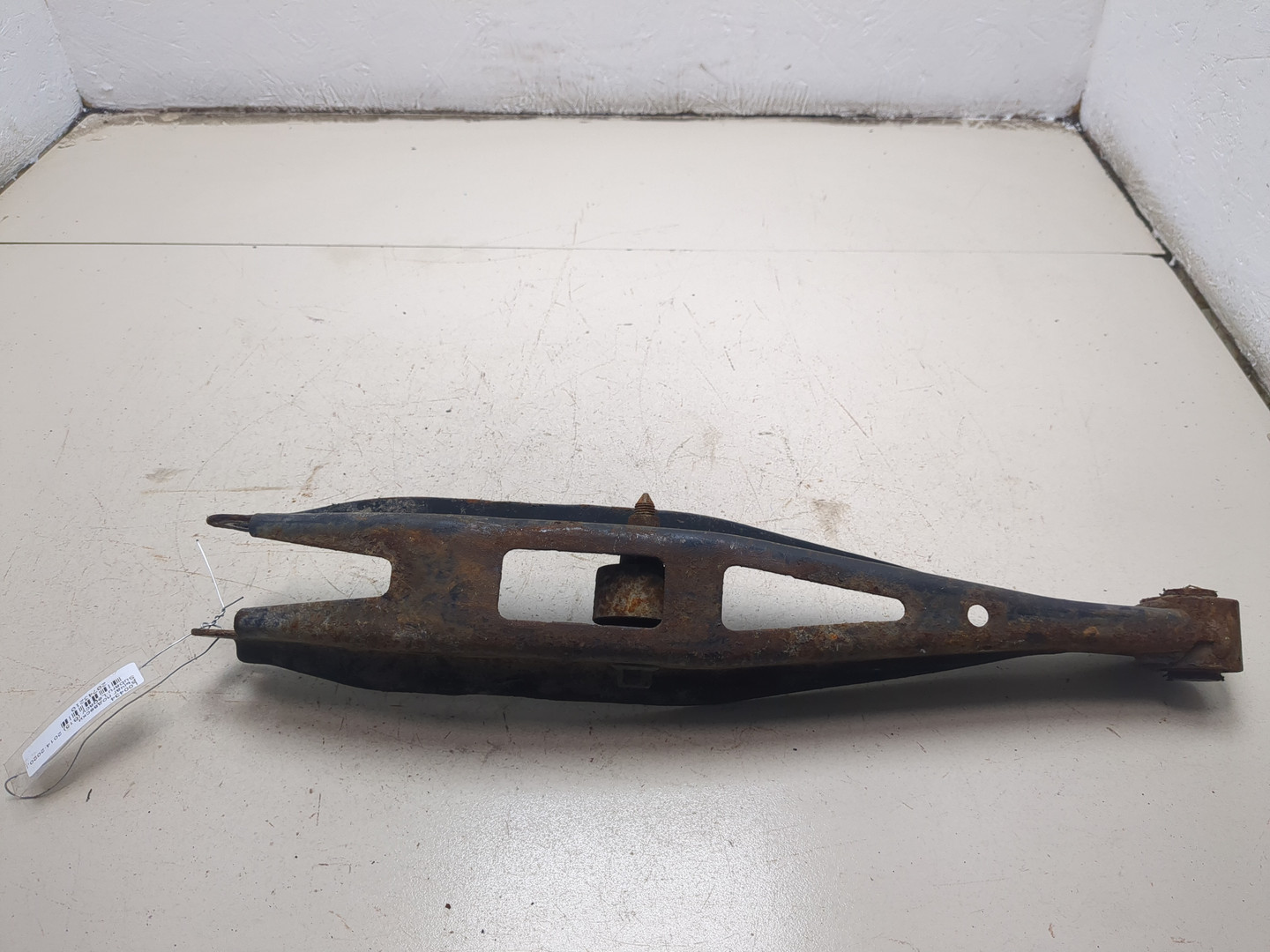 Рычаг задний левый