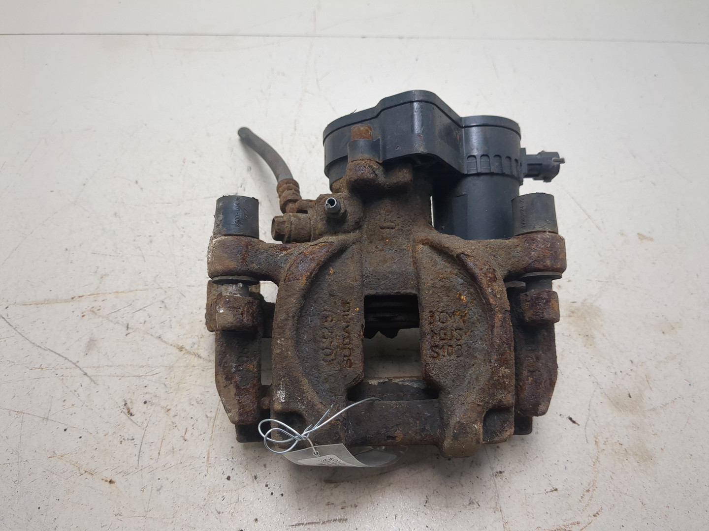 Суппорт задний левый