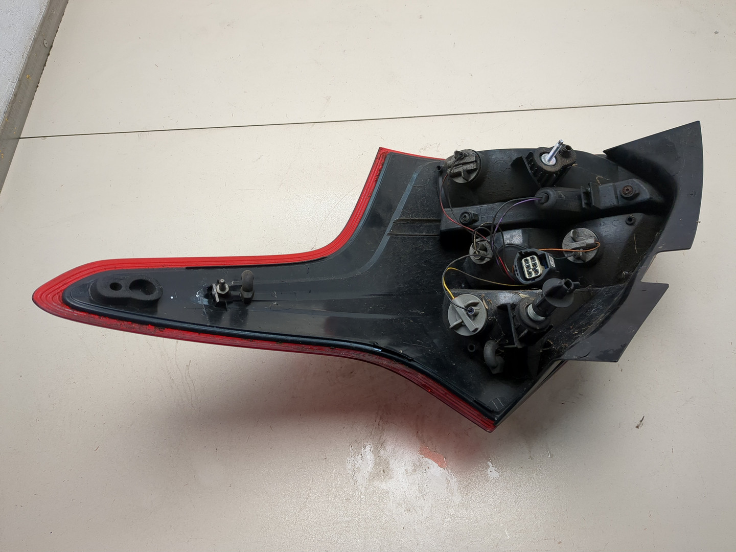 Фонарь задний левый