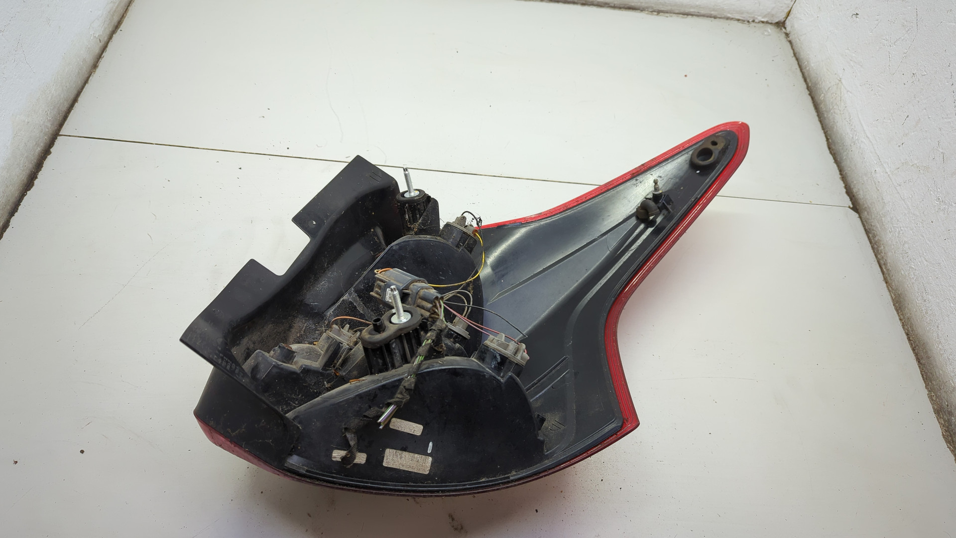 Фонарь задний левый