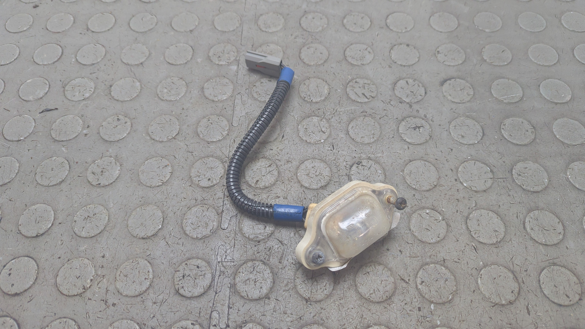 Фонарь подсветки номера