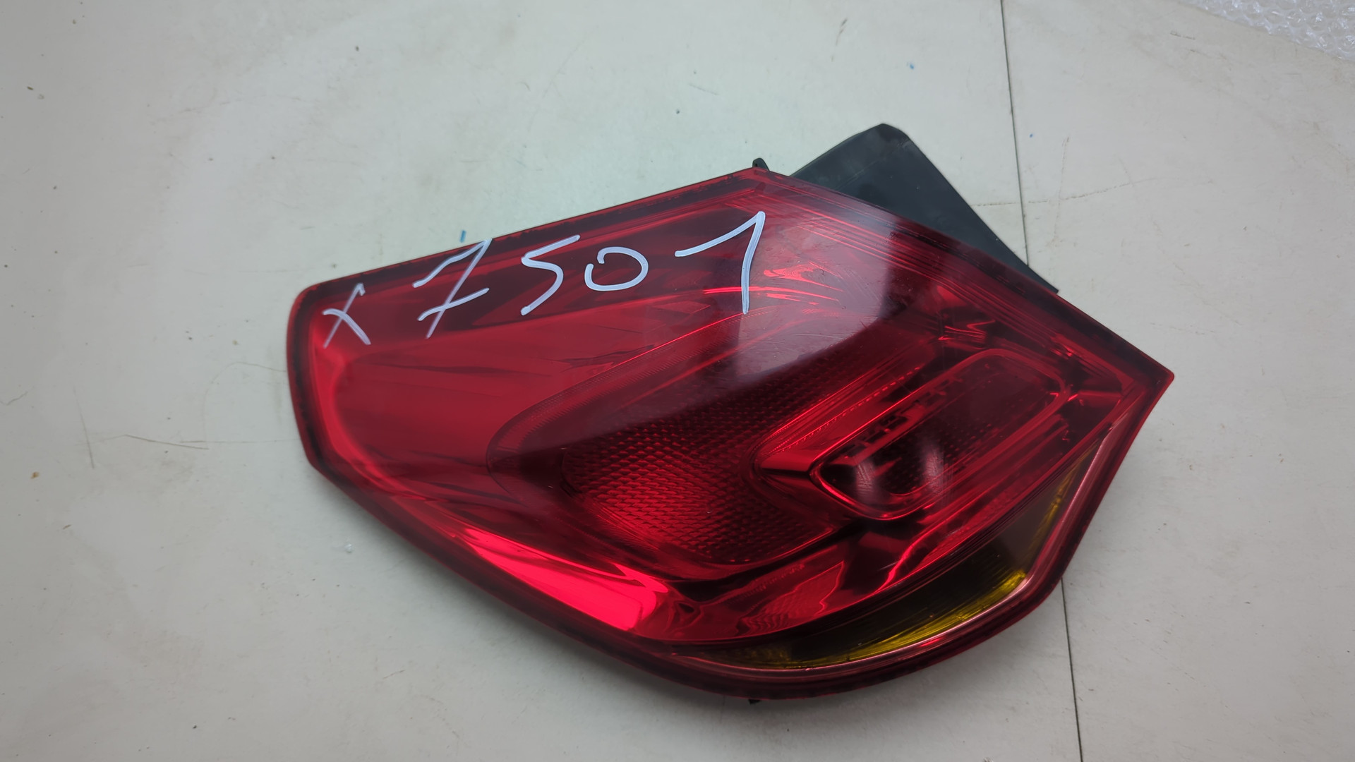 Фонарь задний левый