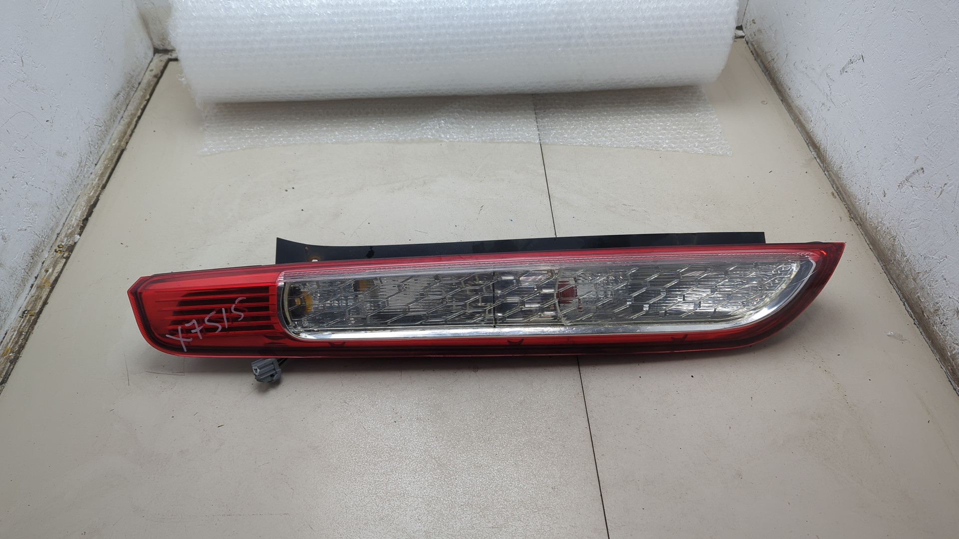 Фонарь задний левый