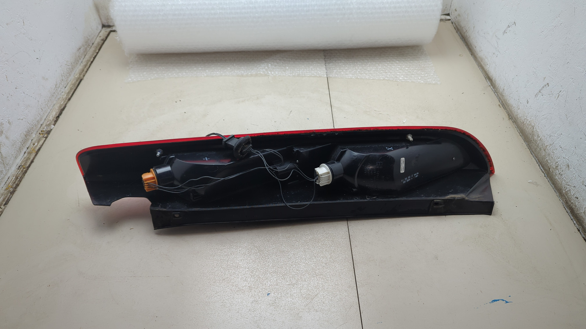 Фонарь задний левый