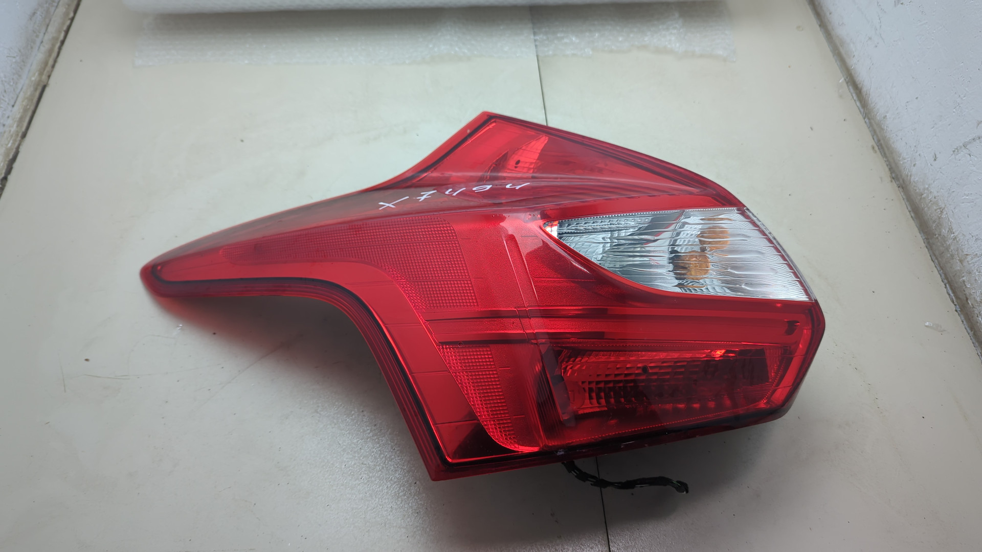 Фонарь задний левый