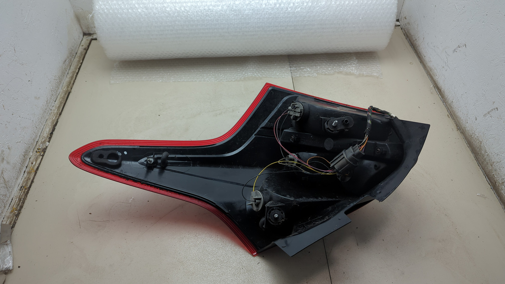 Фонарь задний левый