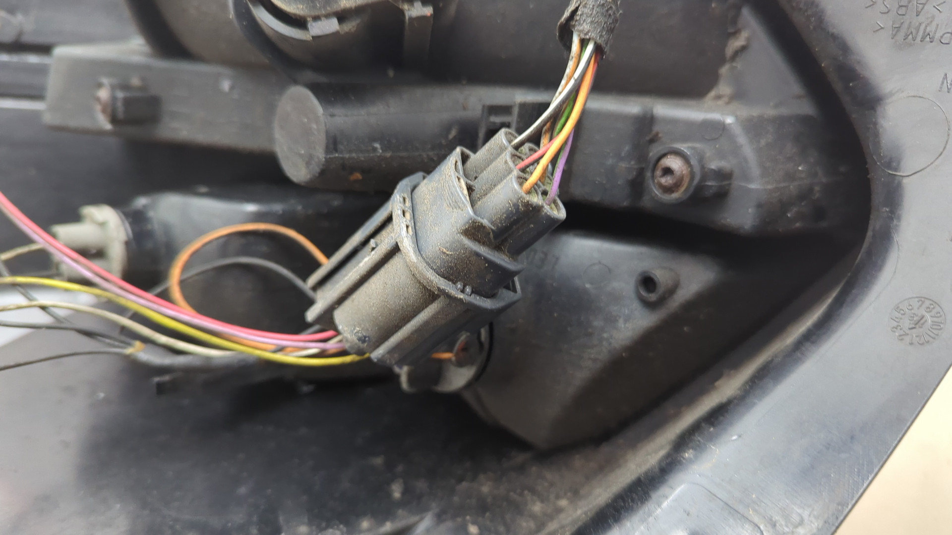 Фонарь задний левый