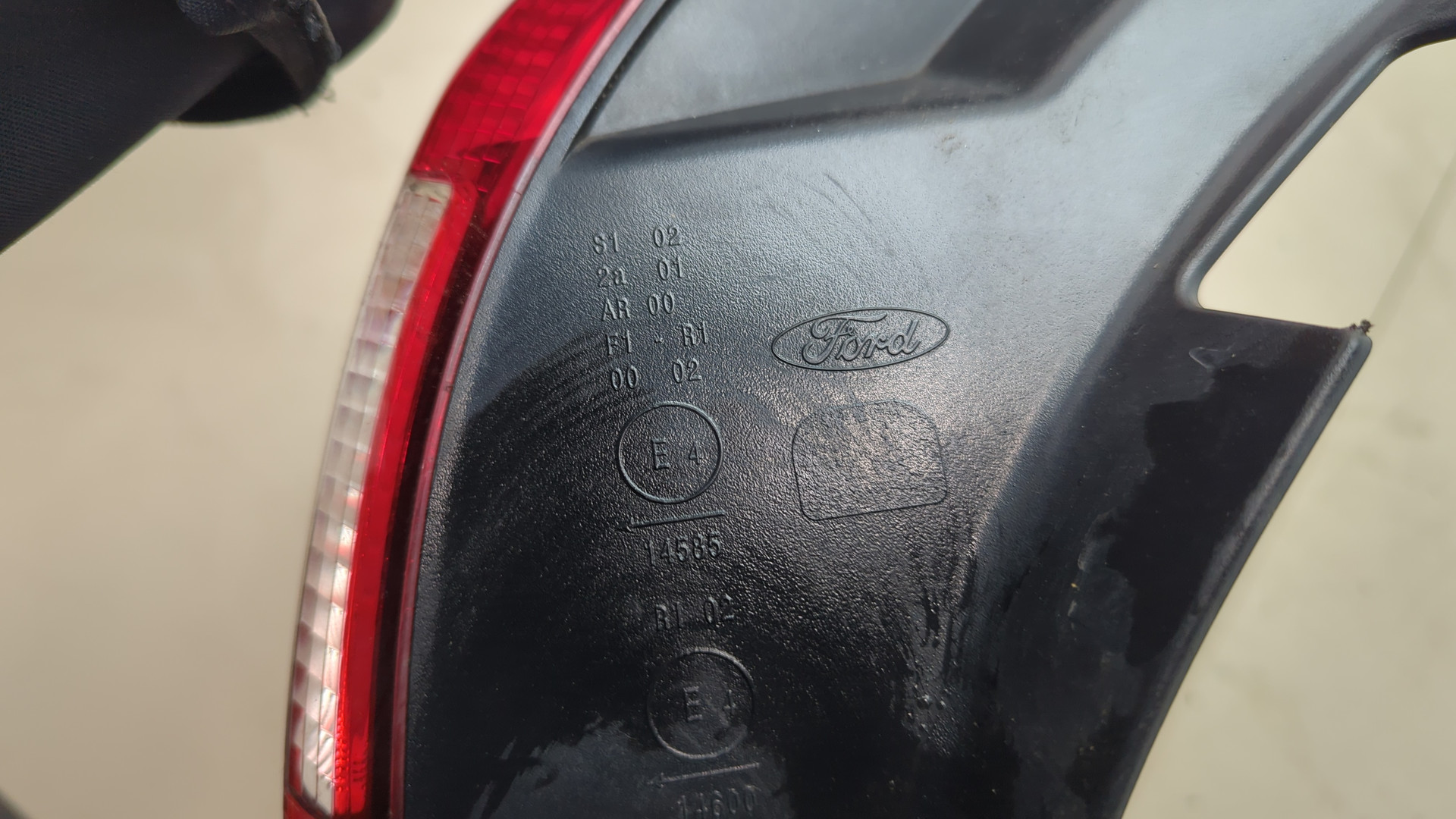 Фонарь задний левый