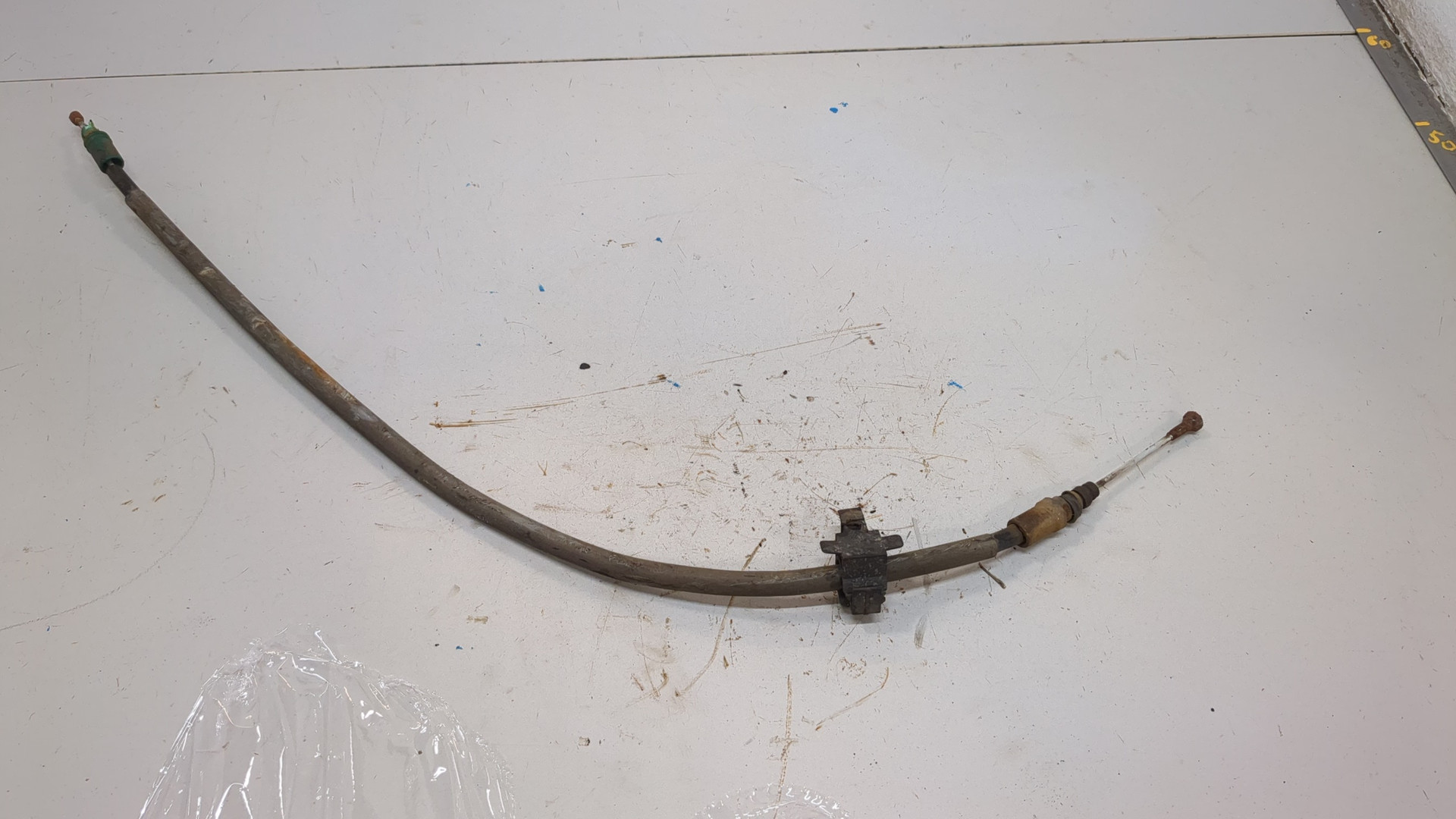 Трос стояночного тормоза