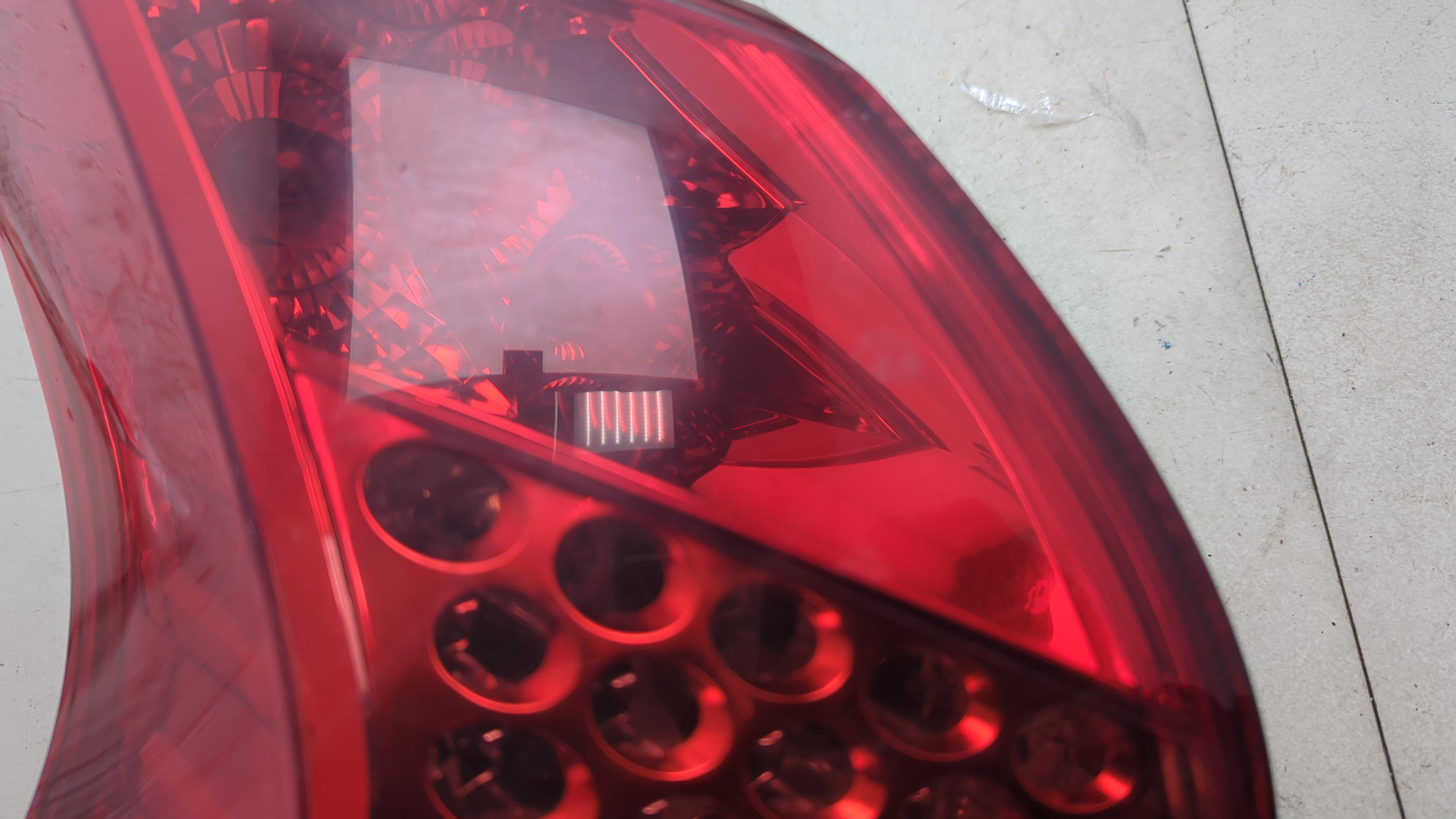 Фонарь задний левый